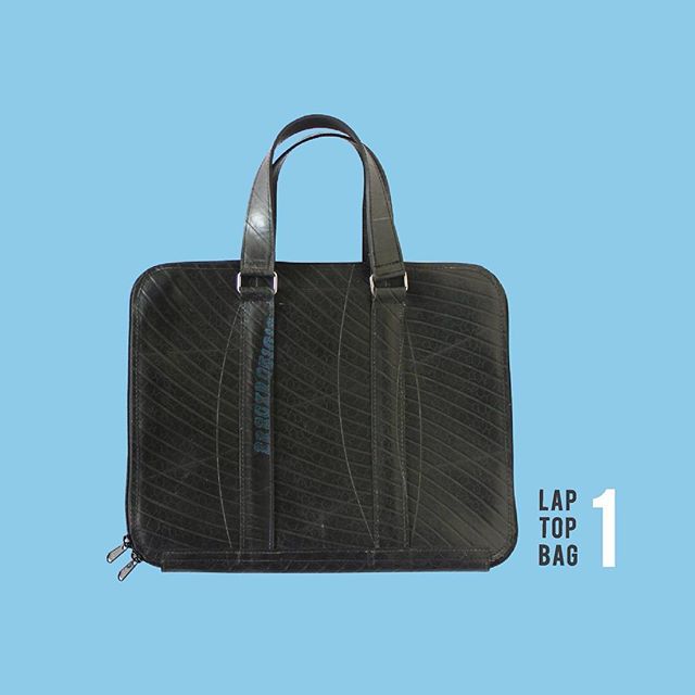 Eco-friendly Slimline Inner Tube Padded Laptop Bag with unique tread patterns, suitable for 13-inch laptops.