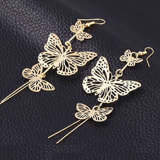 A pair of large, stylish butterfly earrings made from alloy, measuring 10cm by 3.8cm, showcasing intricate design and elegance.