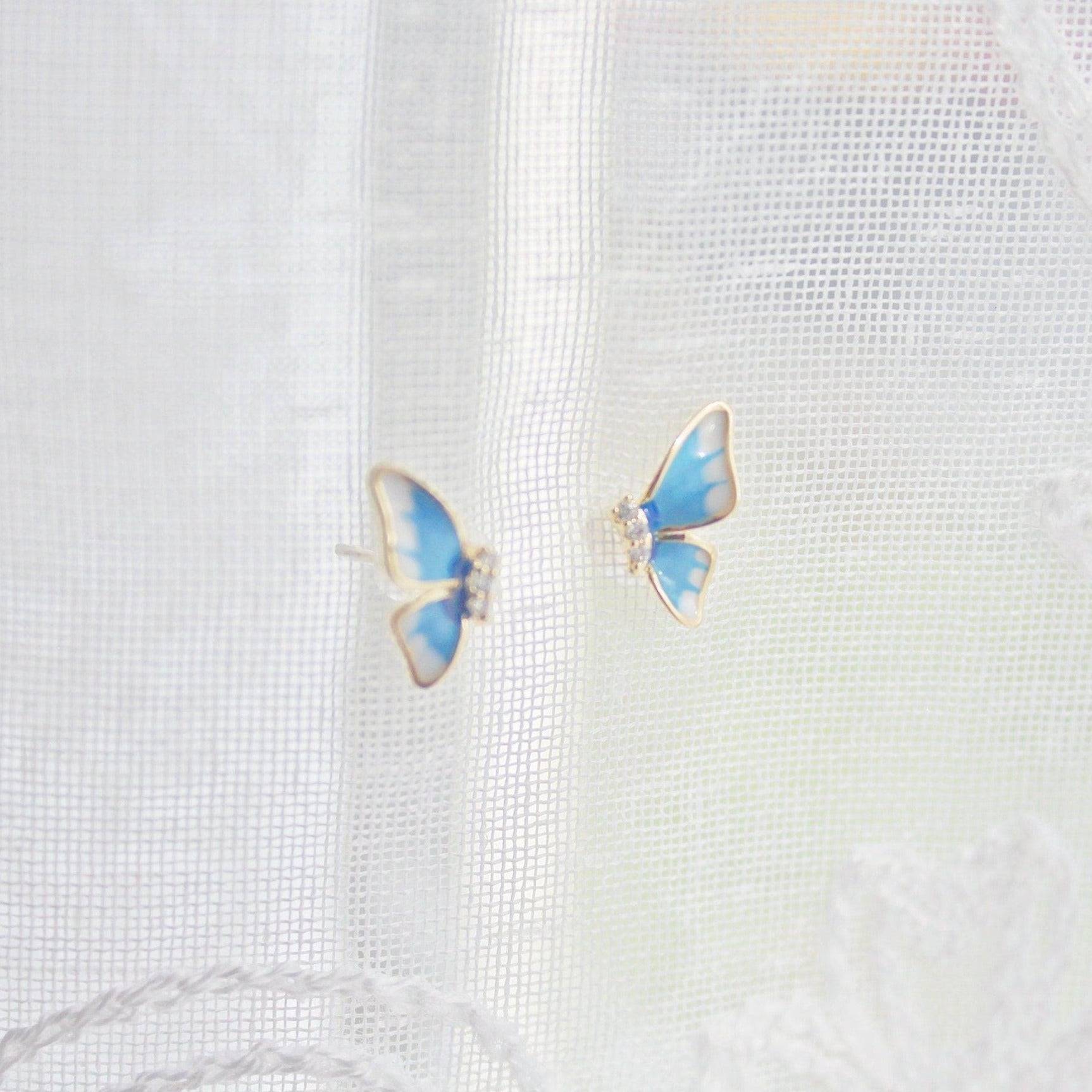 Small Holly Blue Butterfly Earrings made of sterling silver, featuring a delicate butterfly design, perfect for gifting.