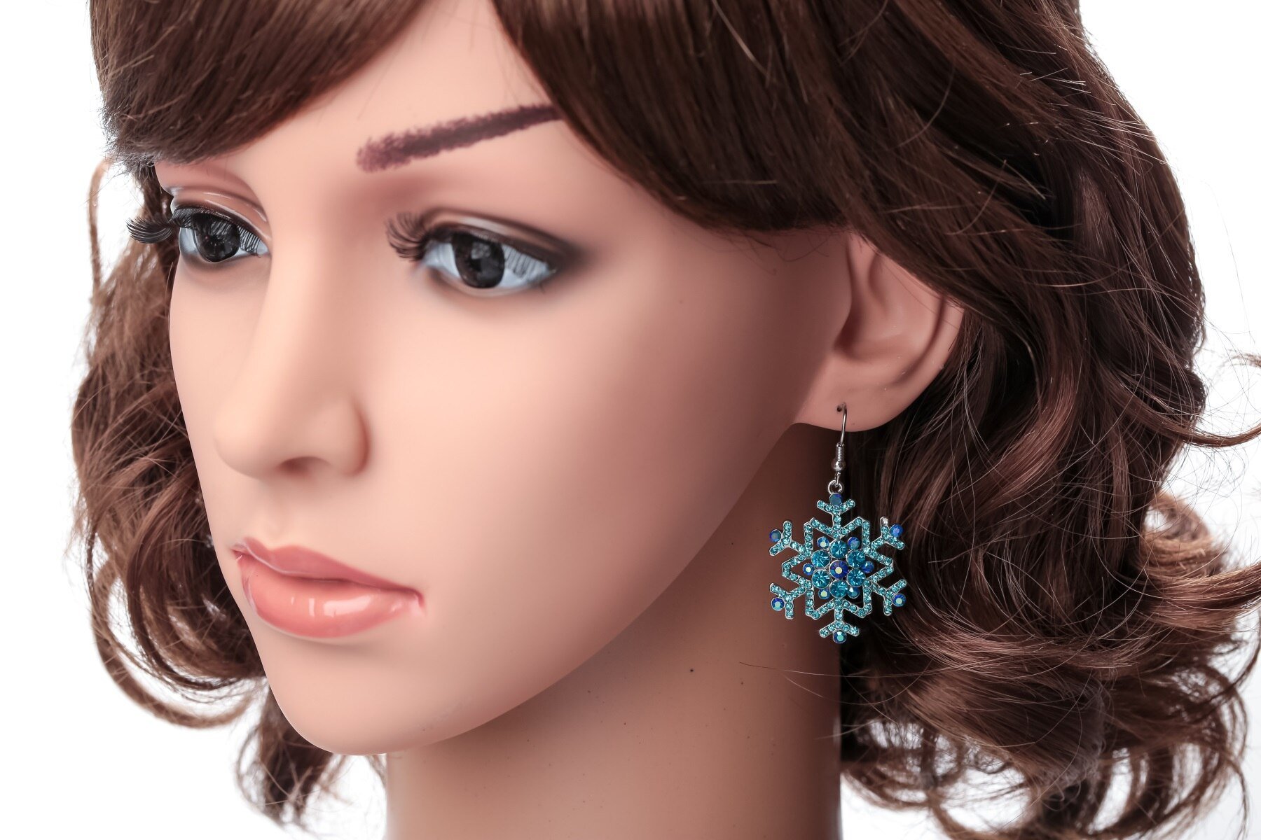 Elegant blue and white snowflake earrings and ring set, perfect for Christmas and holiday celebrations, featuring sparkling crystals.