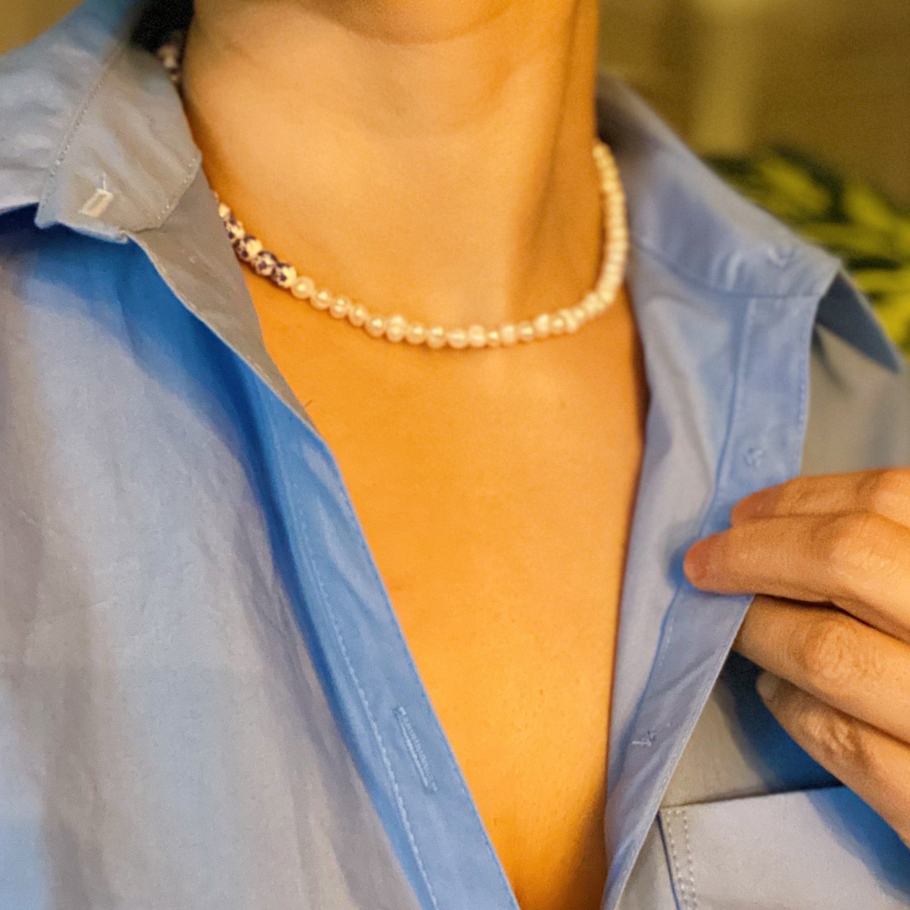 So Fresh Pearl and Porcelain Choker Necklace featuring freshwater pearls and ceramic beads, elegantly designed with gold plated stainless steel accents.