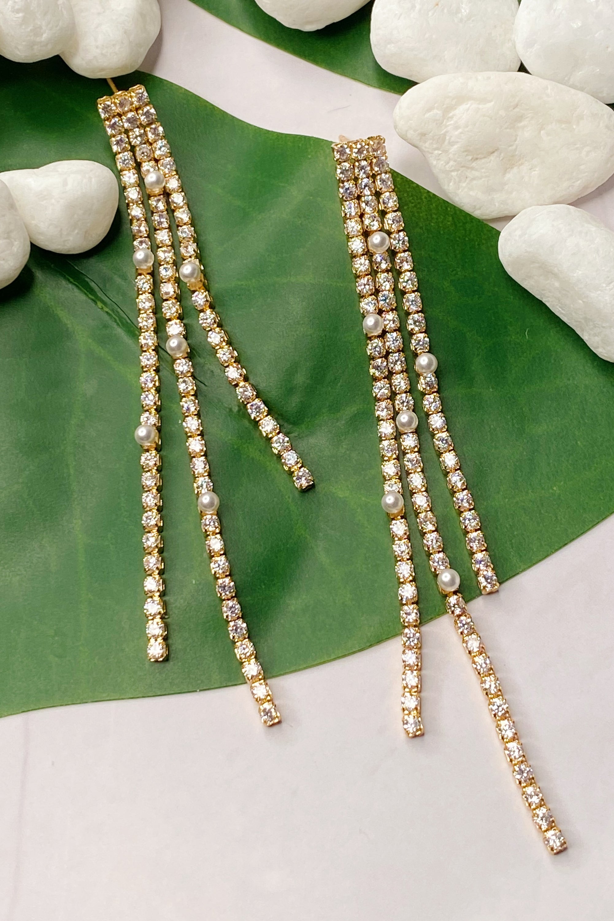 So Influencer Earrings featuring three sparkly strands and tiny glass pearls, elegantly designed for a stylish statement.