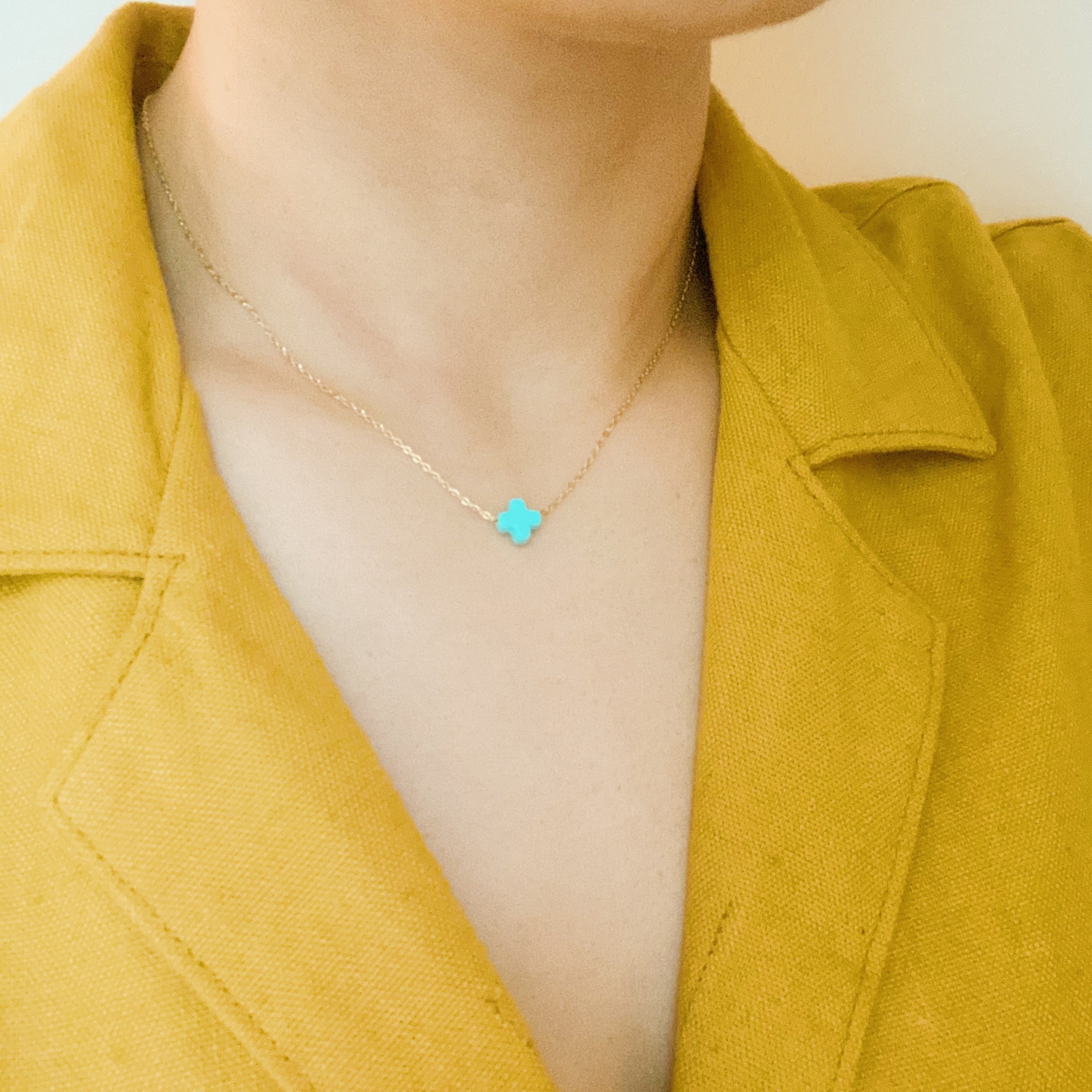 So Very Blessed Cross Necklace featuring a gold plated brass cross and colorful natural stone beads on a stainless steel chain.