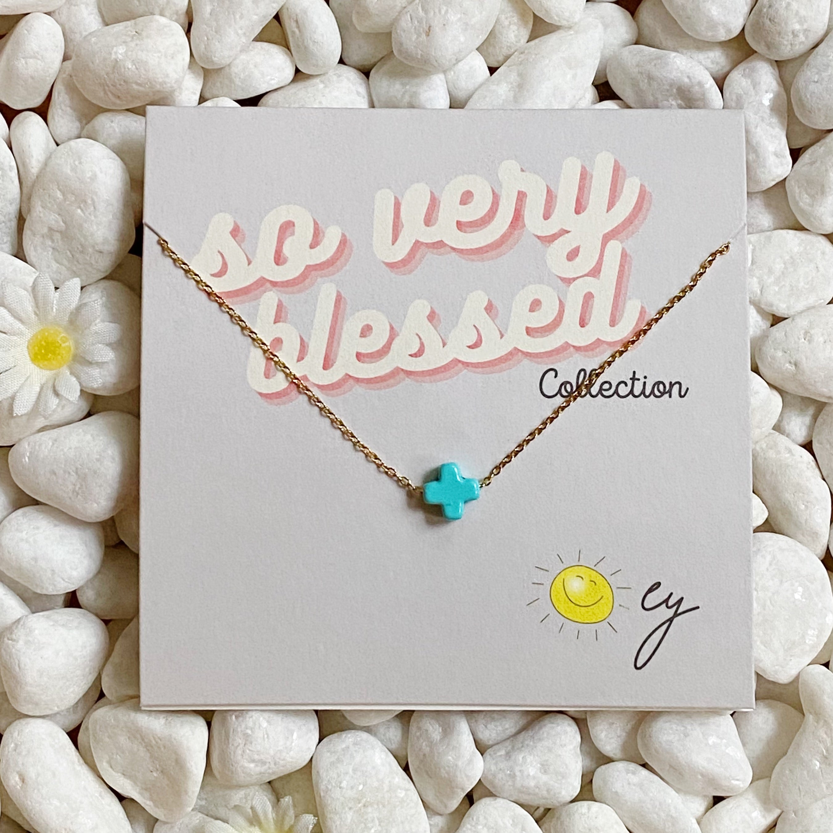 So Very Blessed Cross Necklace featuring a gold plated brass cross and colorful natural stone beads on a stainless steel chain.