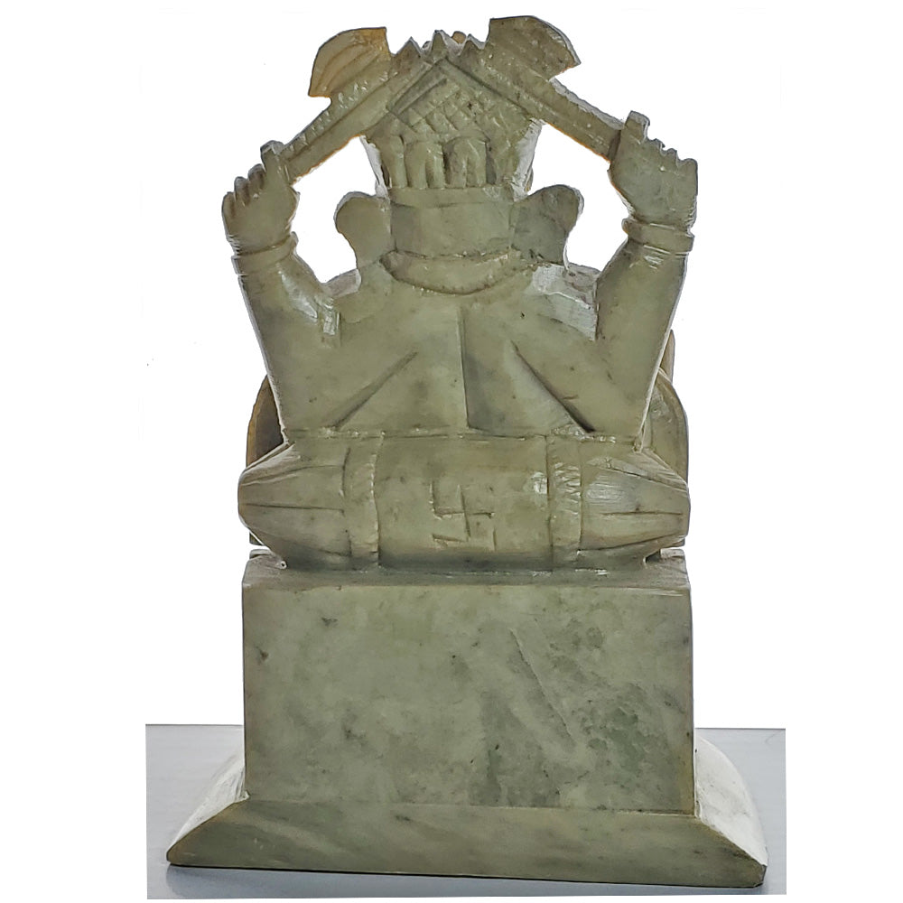 Handcrafted soapstone Ganesha statue, symbolizing new beginnings and prosperity, featuring intricate details and vibrant colors.