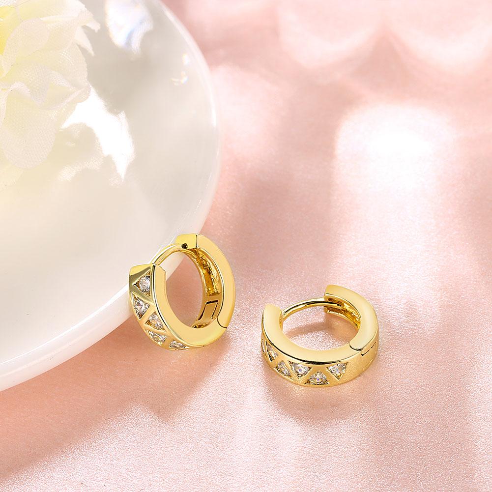 Elegant Solitaire Elements Mini Clip On Earrings featuring certified crystals and 18K gold plating, designed for comfort and style.