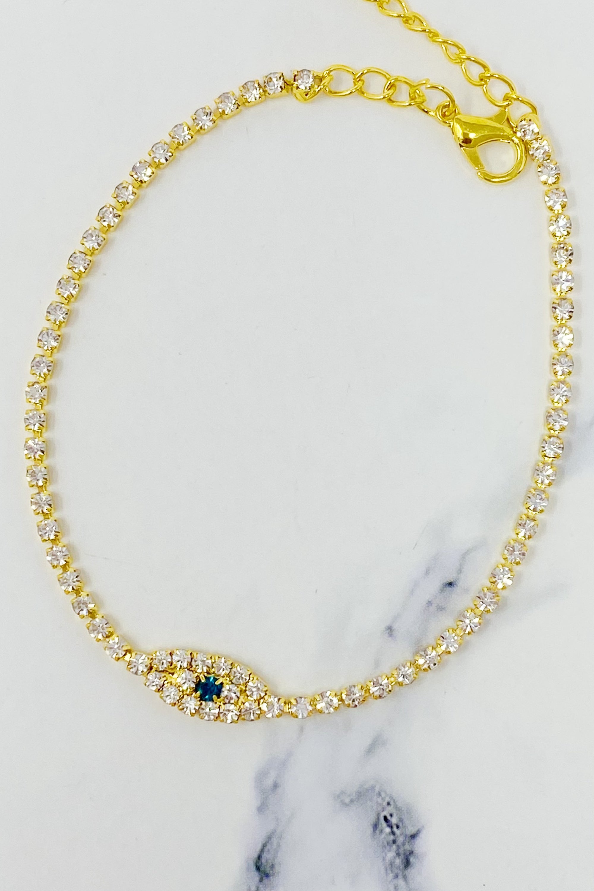 Sparkle Evil Eye Anklet featuring cubic zirconia and an evil eye pendant, adjustable length with extender.