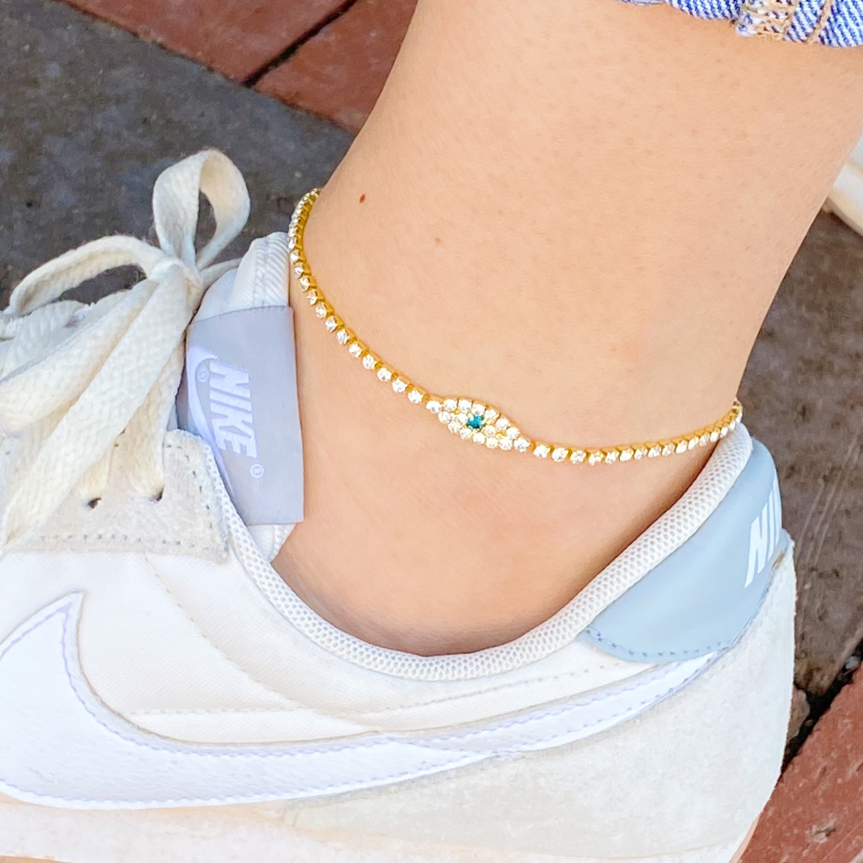 Sparkle Evil Eye Anklet featuring cubic zirconia and an evil eye pendant, adjustable length with extender.