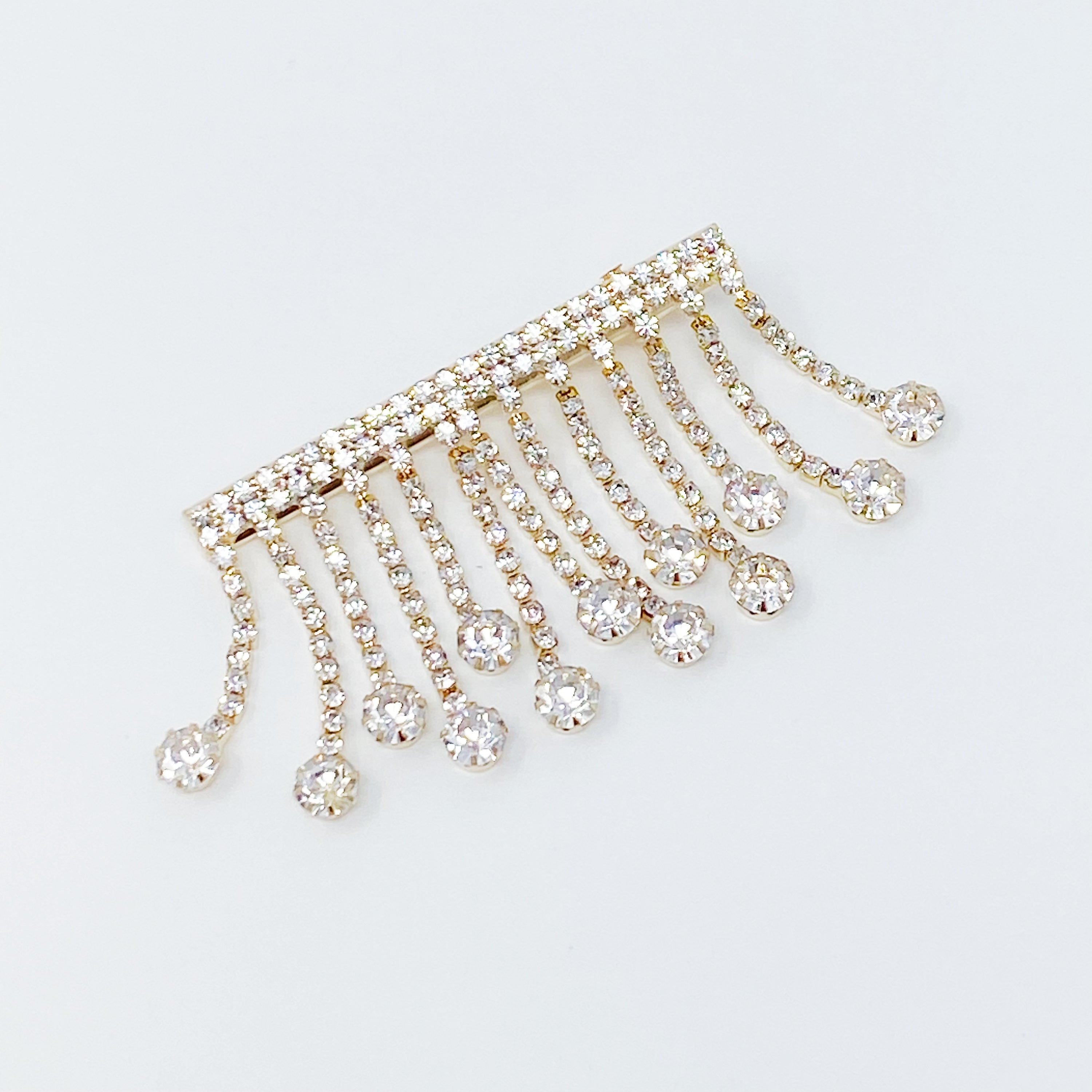 A stylish Sparkling Cascade Hair Clip featuring dangling sparkles, perfect for enhancing hairstyles.