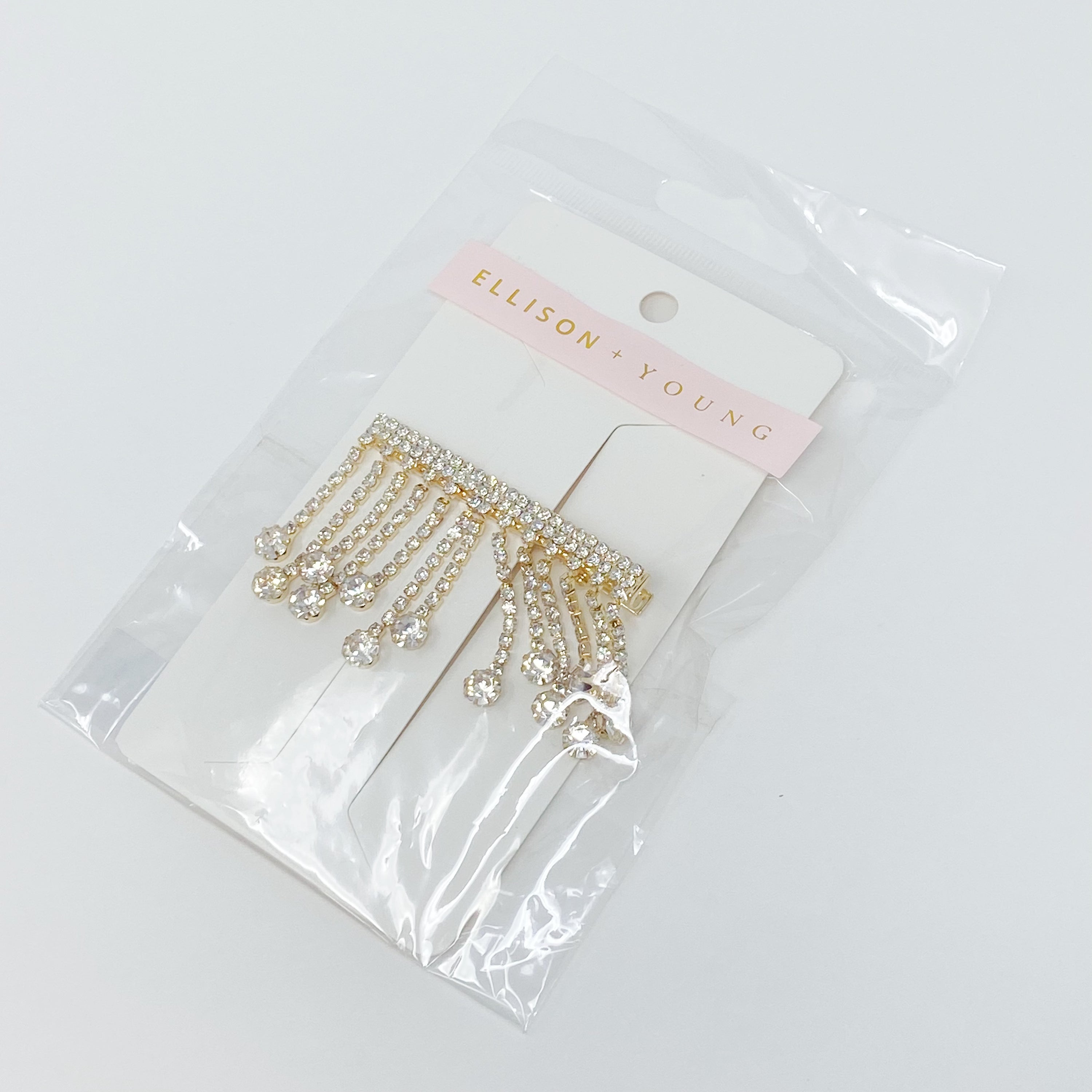 A stylish Sparkling Cascade Hair Clip featuring dangling sparkles, perfect for enhancing hairstyles.