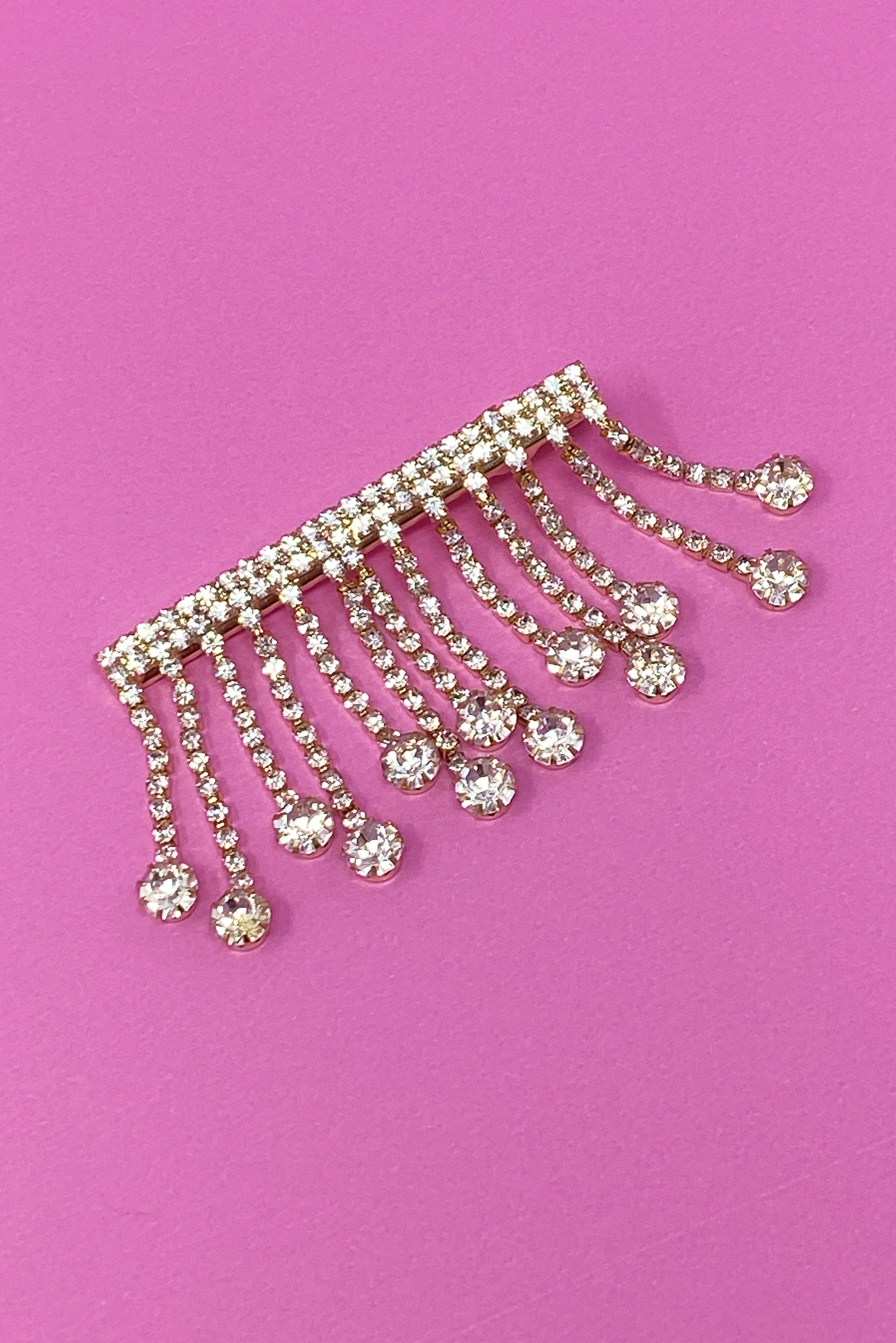 A stylish Sparkling Cascade Hair Clip featuring dangling sparkles, perfect for enhancing hairstyles.