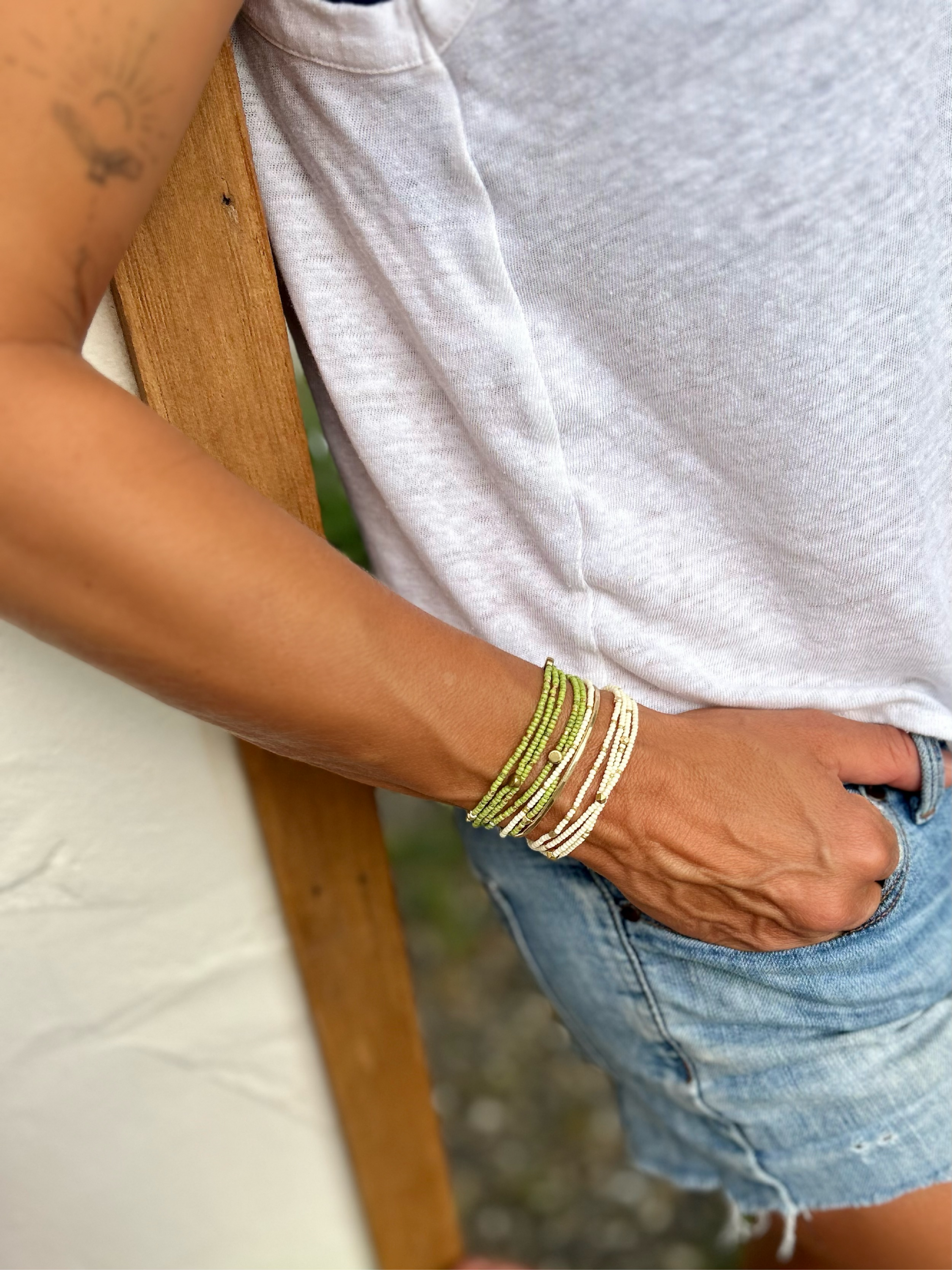 Speckled lime green and gold-sprinkled beaded 5-wrap bracelet made from MIYUKI glass seed beads, showcasing vibrant colors and elegant design.