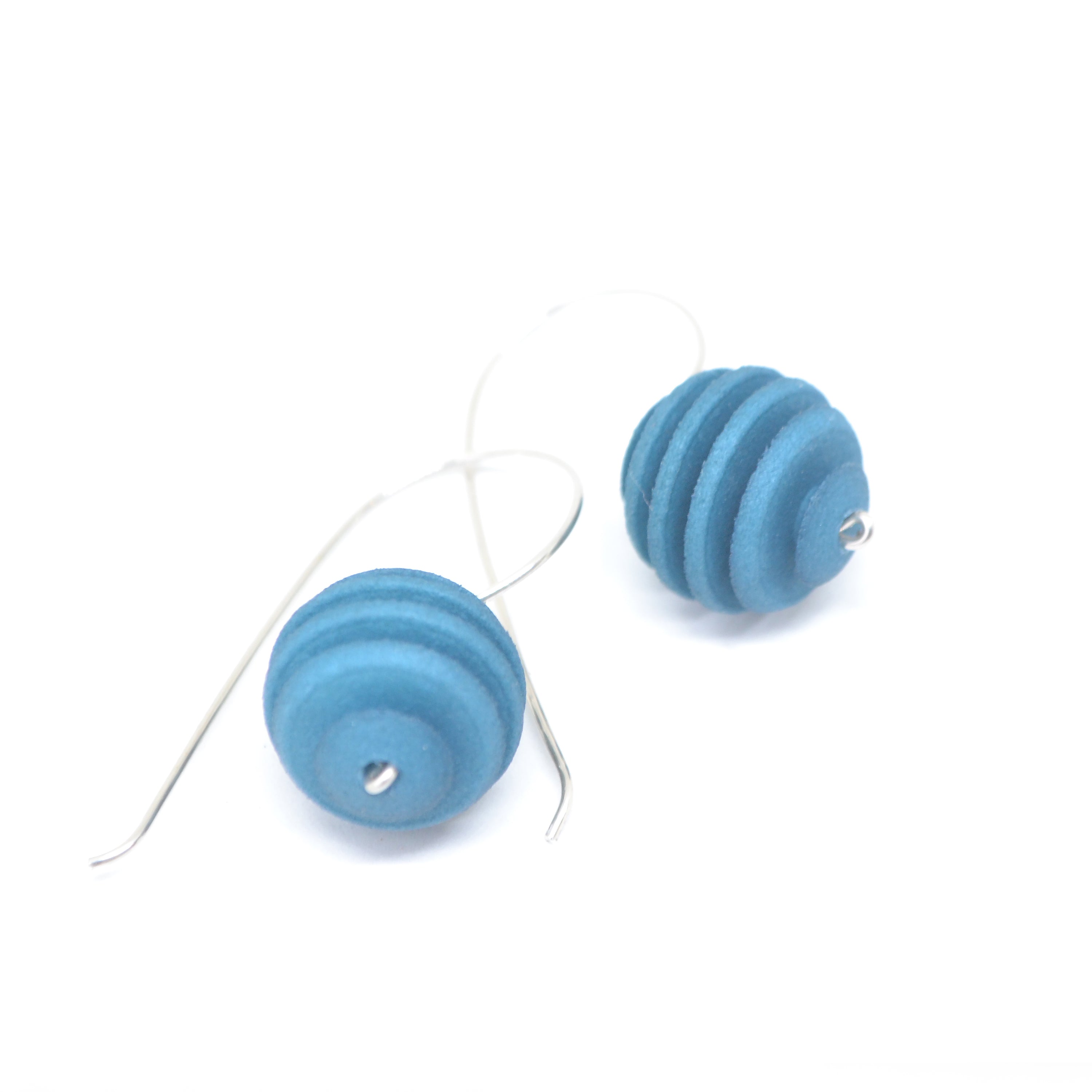 Sphere Earrings featuring an Optical design with Sterling Silver hooks, showcasing a modern twist on classic pearl earrings.