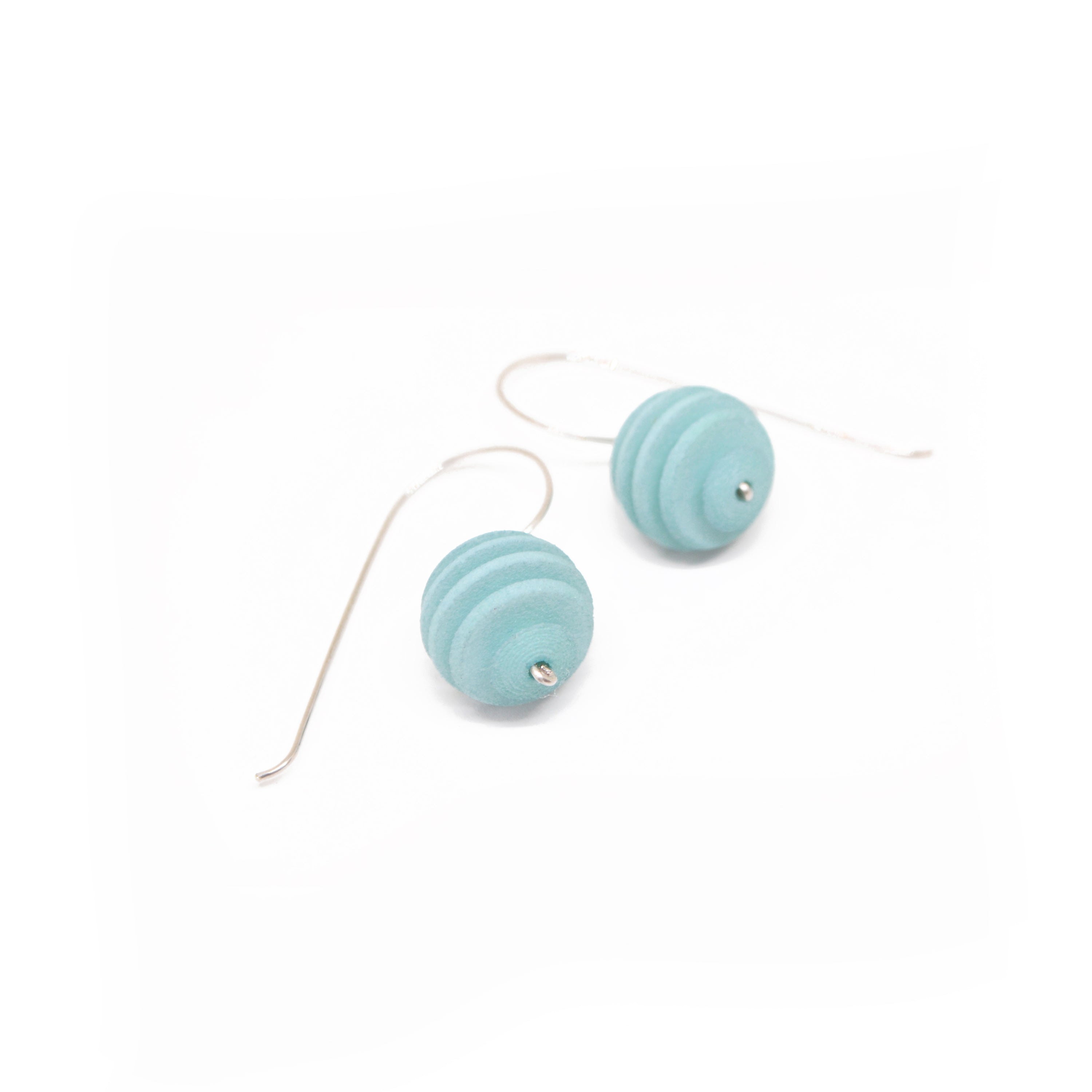 Sphere Earrings featuring an Optical design with Sterling Silver hooks, showcasing a modern twist on classic pearl earrings.