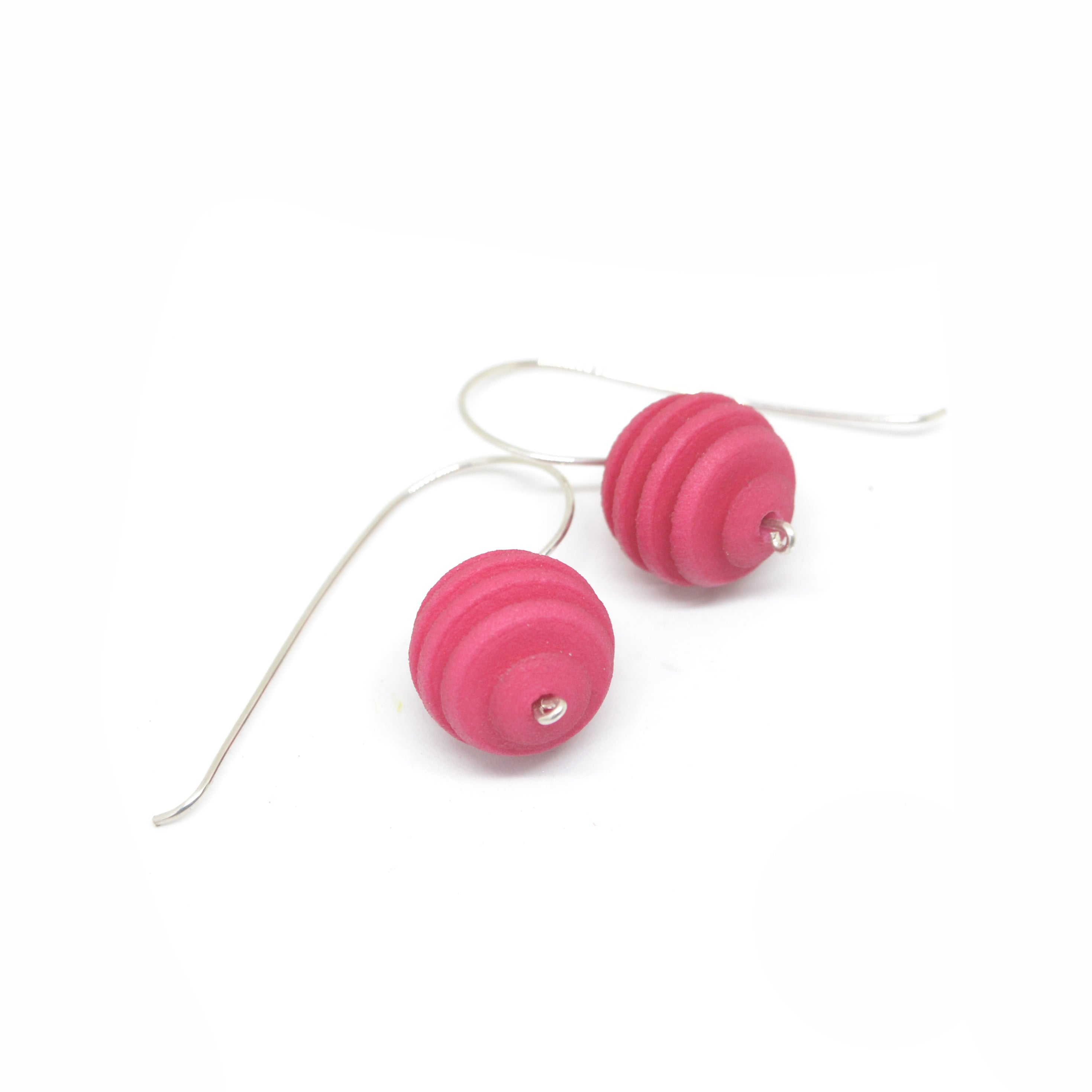 Sphere Earrings featuring an Optical design with Sterling Silver hooks, showcasing a modern twist on classic pearl earrings.