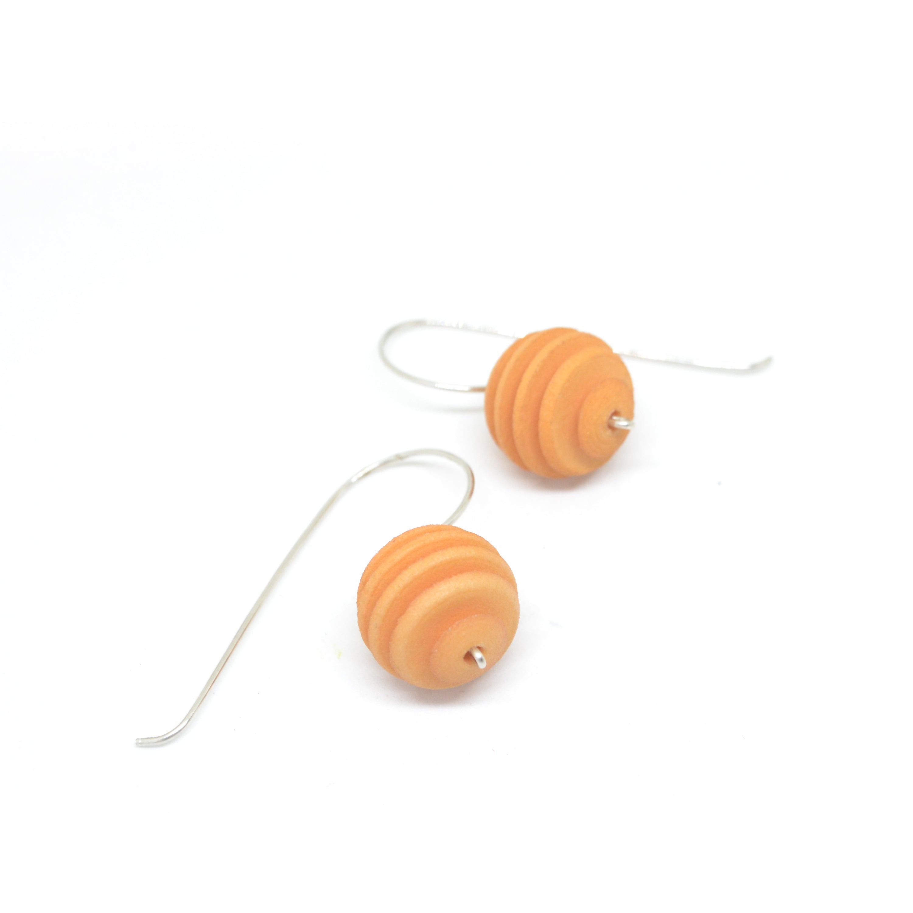 Sphere Earrings featuring an Optical design with Sterling Silver hooks, showcasing a modern twist on classic pearl earrings.