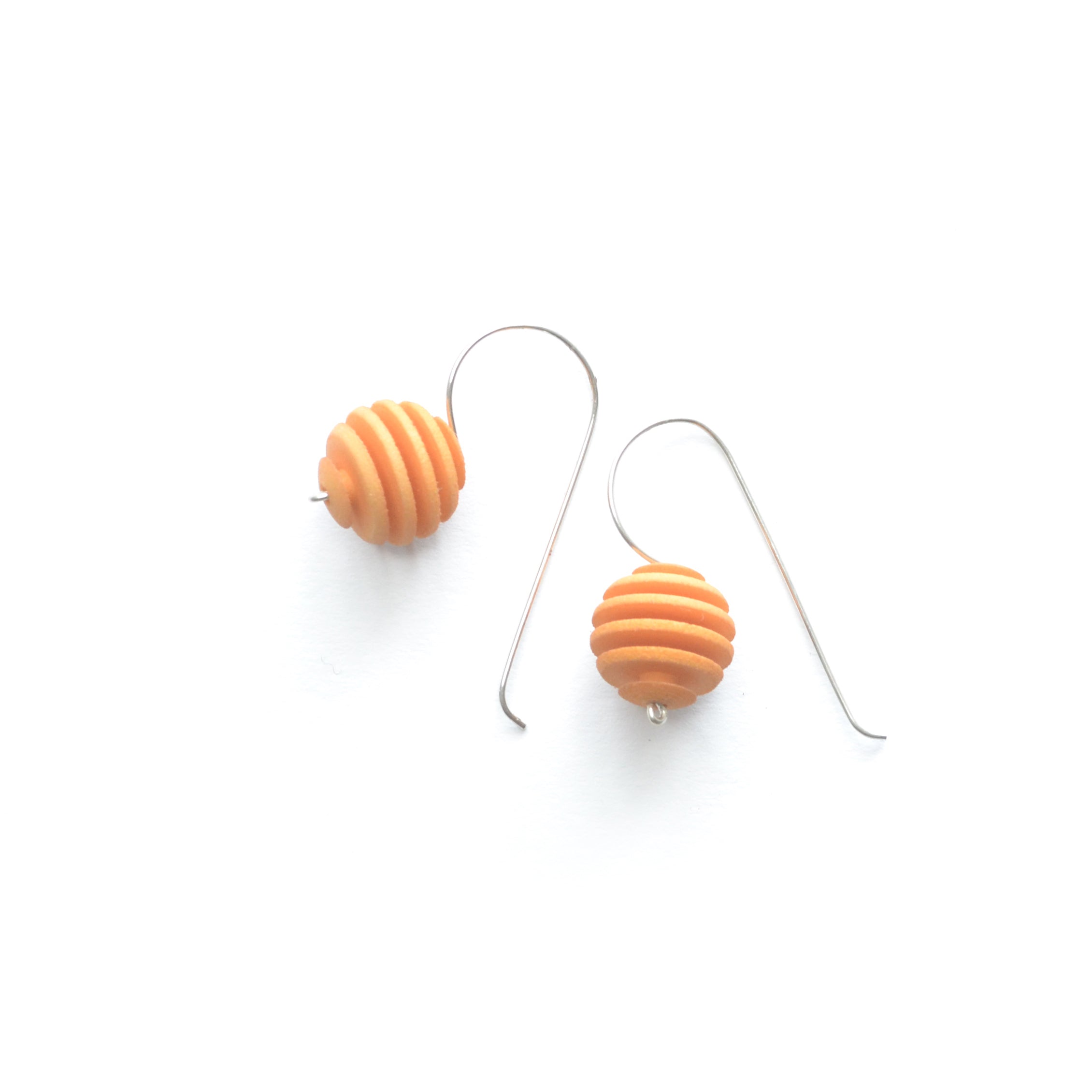 Sphere Earrings featuring an Optical design with Sterling Silver hooks, showcasing a modern twist on classic pearl earrings.