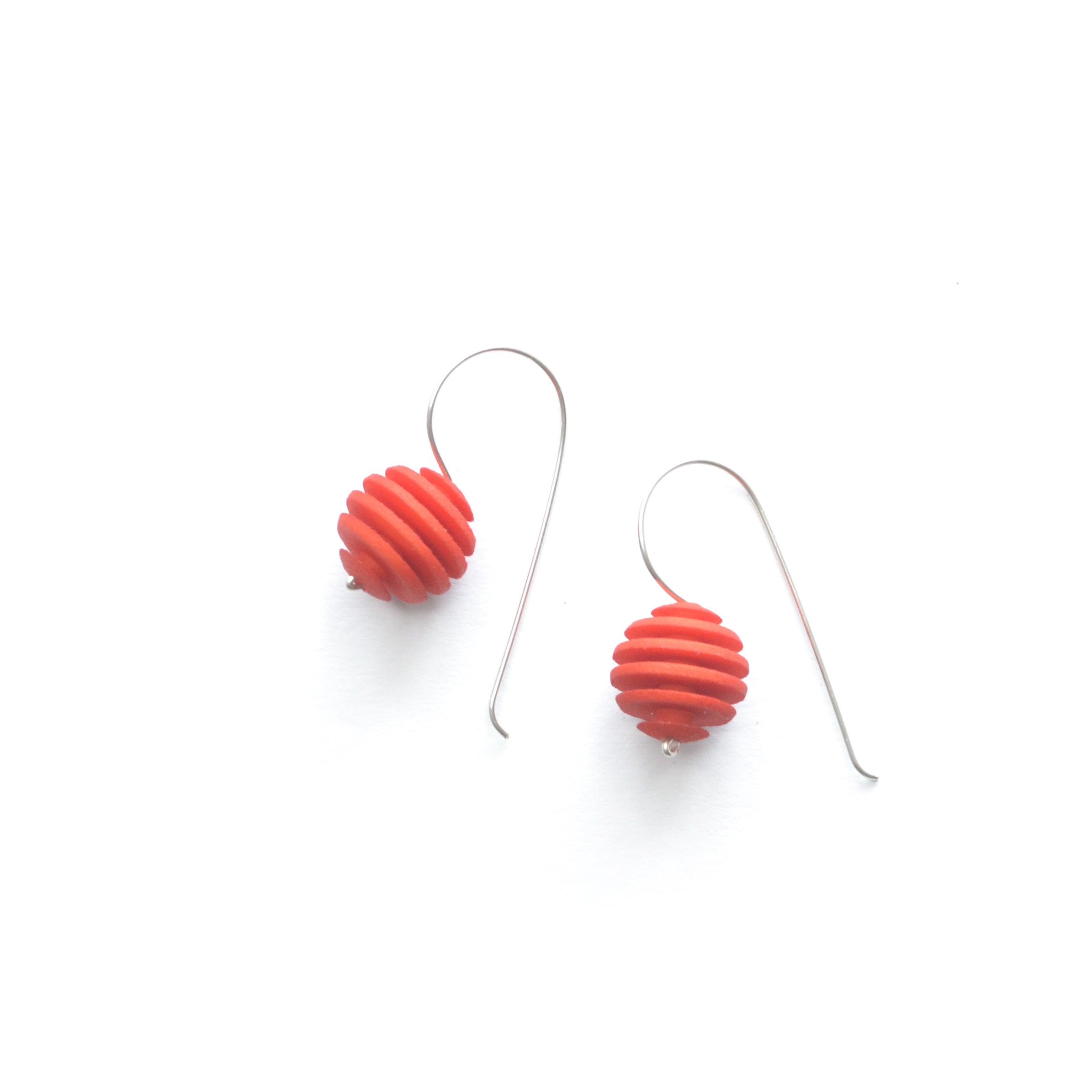 Sphere Earrings featuring an Optical design with Sterling Silver hooks, showcasing a modern twist on classic pearl earrings.