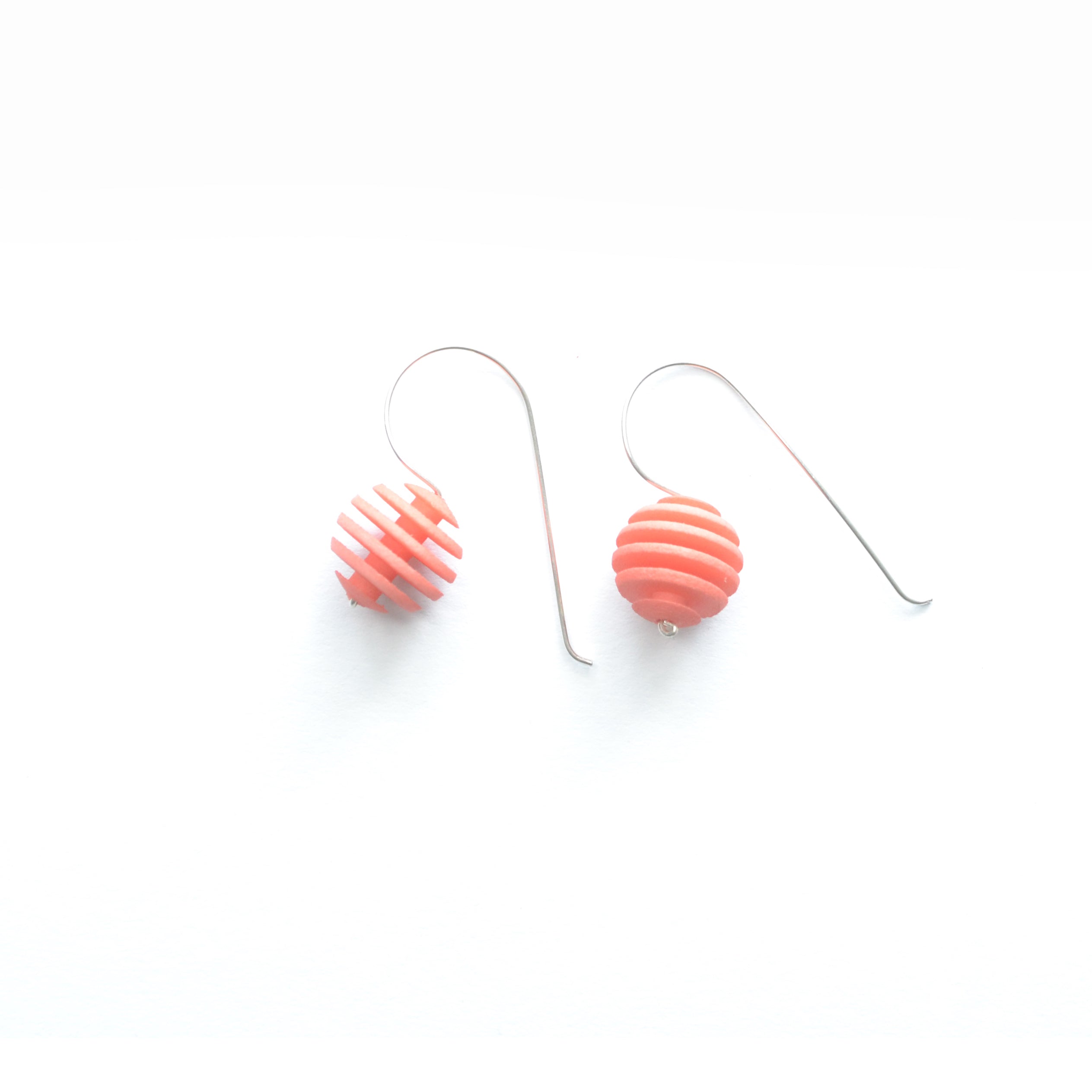 Sphere Earrings featuring an Optical design with Sterling Silver hooks, showcasing a modern twist on classic pearl earrings.