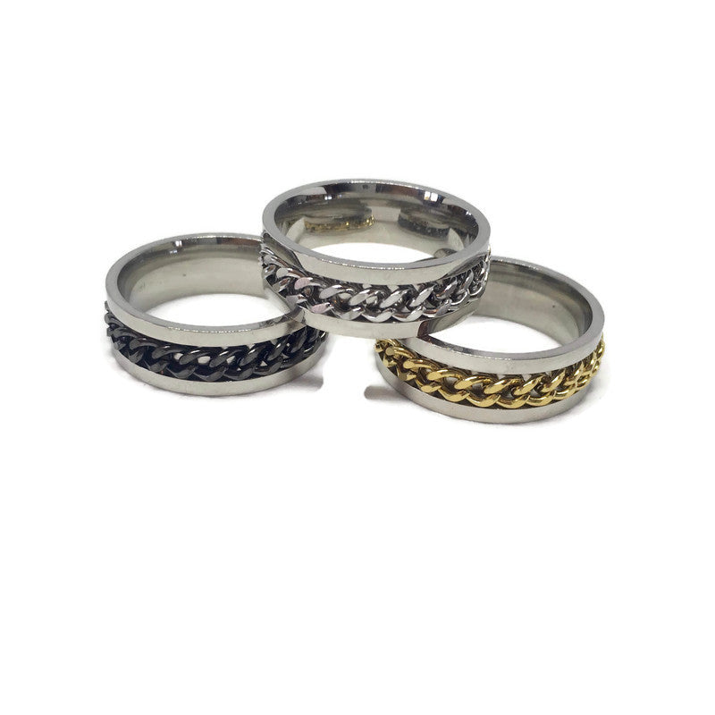 Spinning Curb Chain Band Ring made of stainless steel, featuring a unique spinning design, available in various sizes and colors.