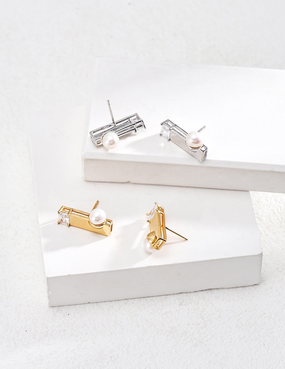 Elegant Square Pearl Zircon Earrings featuring freshwater pearls and gold vermeil, showcasing their unique square design.