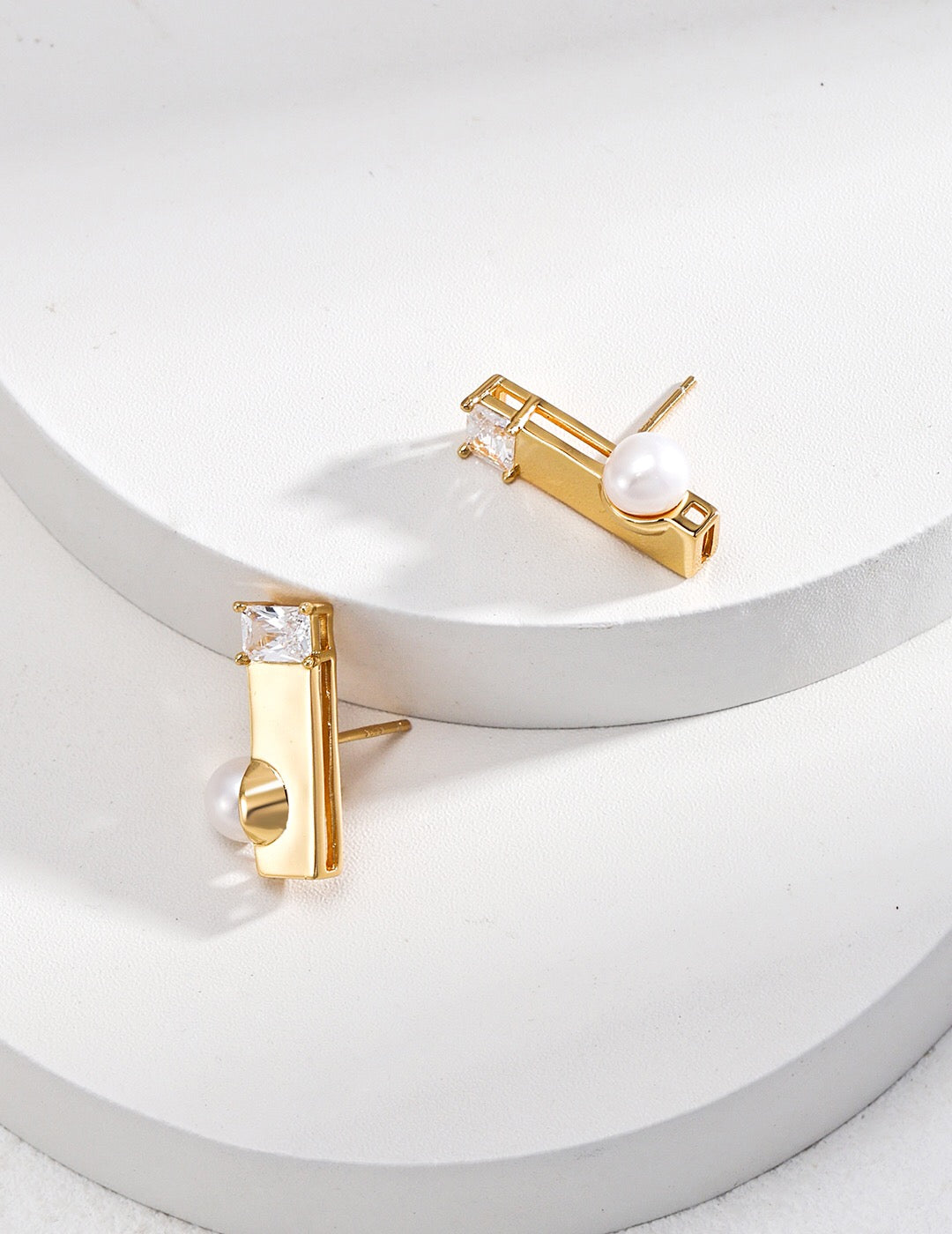 Elegant Square Pearl Zircon Earrings featuring freshwater pearls and gold vermeil, showcasing their unique square design.