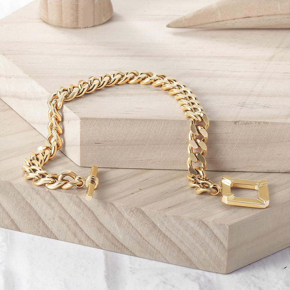 A stylish Square Toggle Clasp Chain Bracelet made of 316L surgical stainless steel with 14K gold PVD plating, showcasing its elegant design.