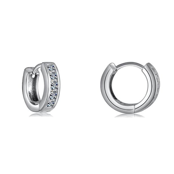 A pair of elegant square white sapphire huggie earrings made from sterling silver with a white gold finish, showcasing their brilliant gemstones.