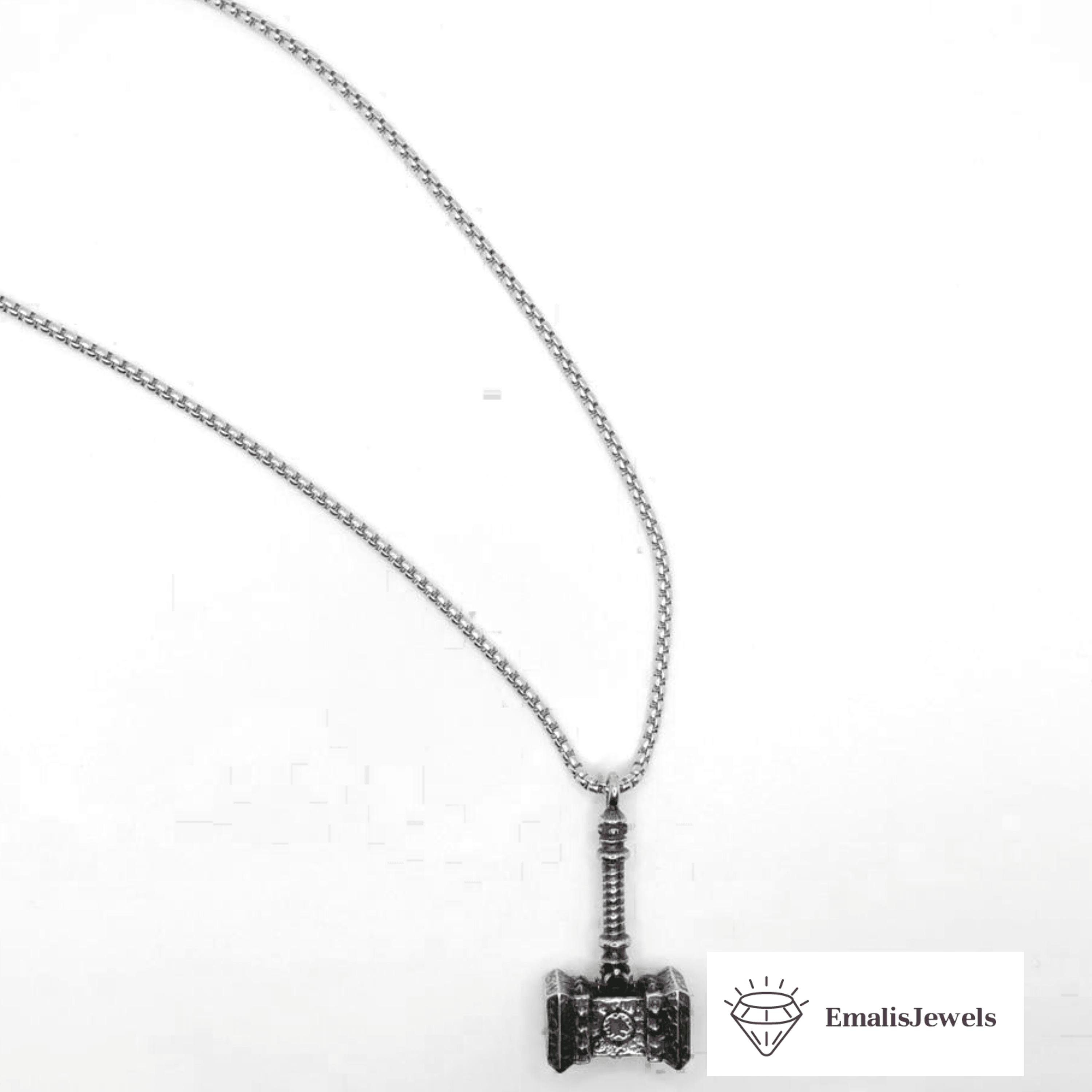 A stainless steel chain necklace featuring a Thor hammer pendant, showcasing intricate details and a sleek design.