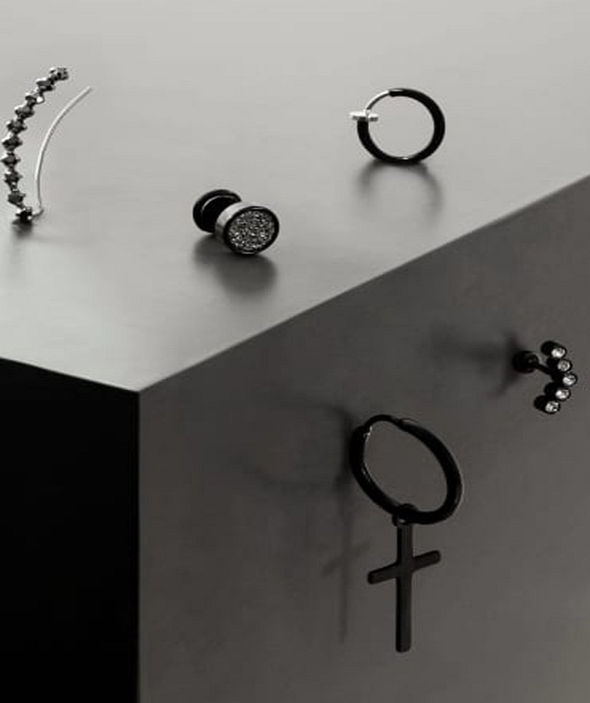 A pair of stainless steel hoop earrings featuring dangling crosses in various sizes, available in gold, silver, and black.