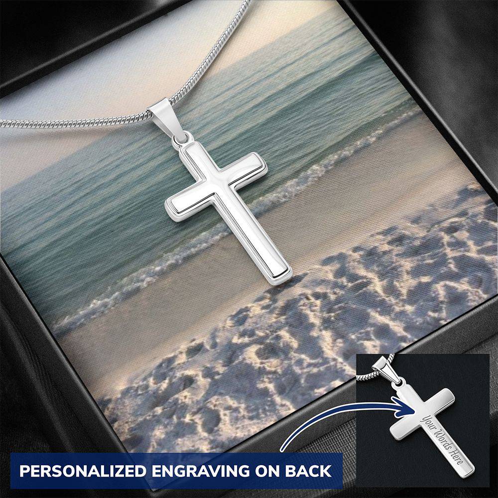 A polished stainless steel cross necklace featuring a personalized pendant, adjustable snake chain, and lobster clasp.