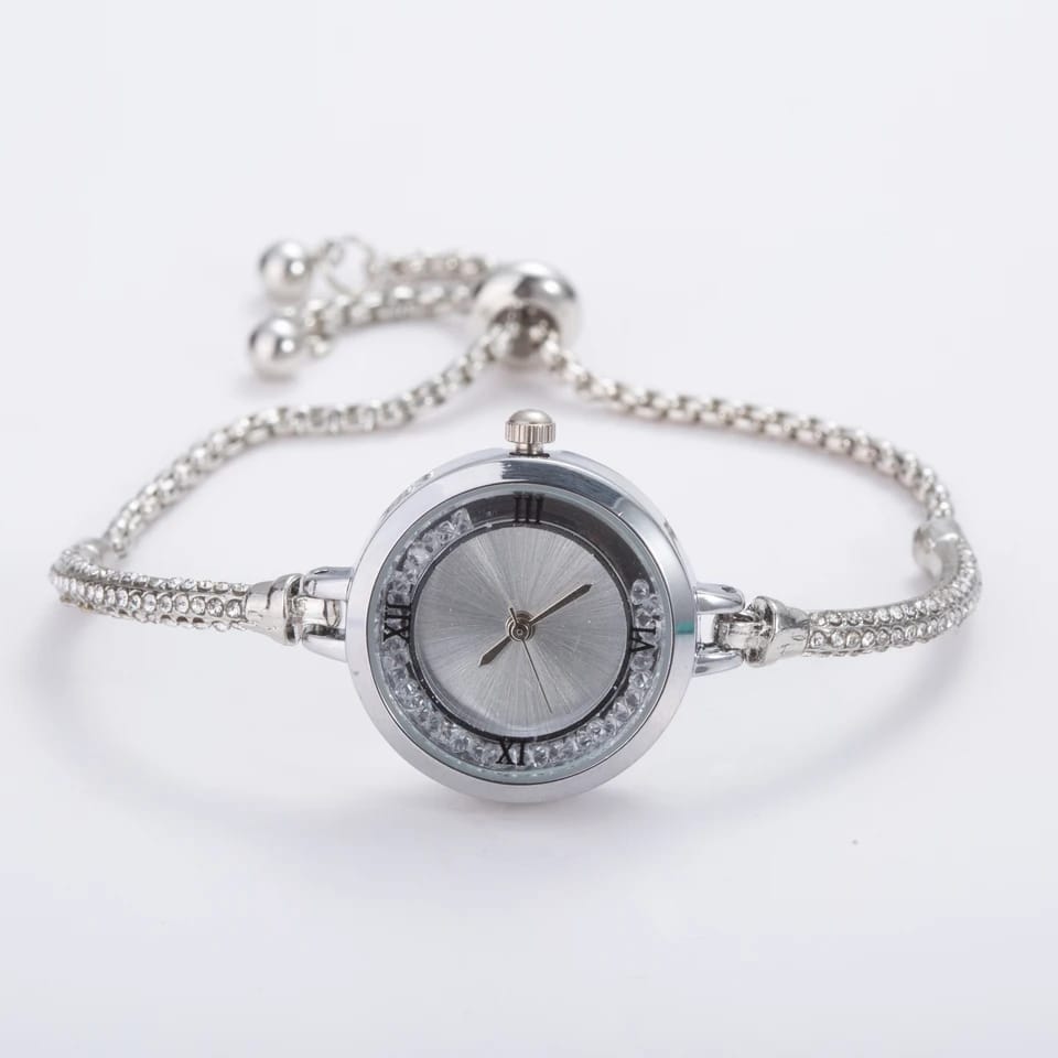 Stainless Steel Gold and Silver Bangle Adjustable Bracelet Wrist Watch with white Roman dial, showcasing elegance and versatility.