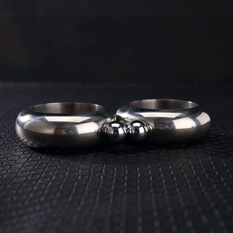 A stylish stainless steel unisex bangle featuring a hidden flask design, perfect for discreetly carrying beverages.