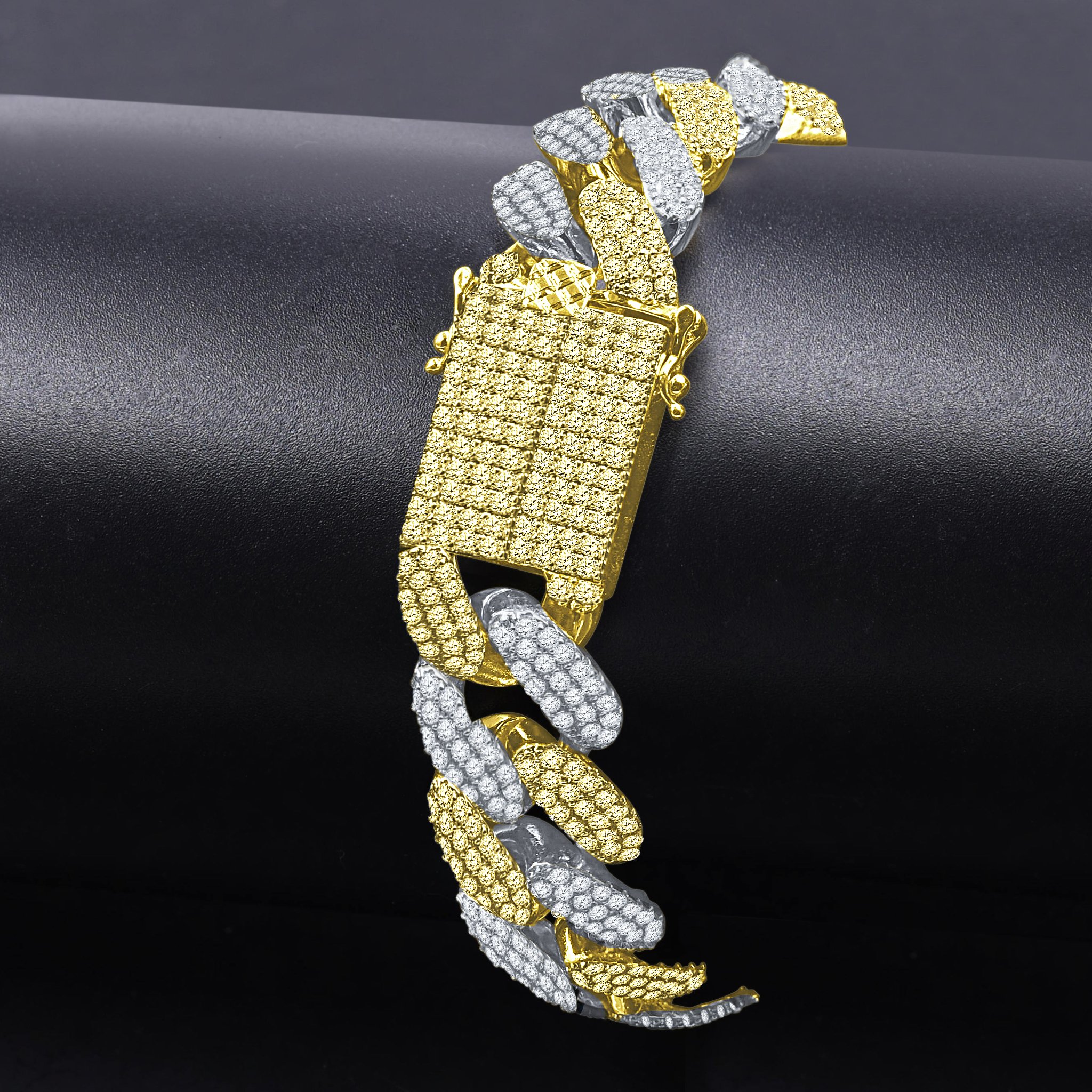 A luxurious STALLION Brass Bracelet featuring a solid cuban link design, adorned with sparkling cubic zirconia stones.