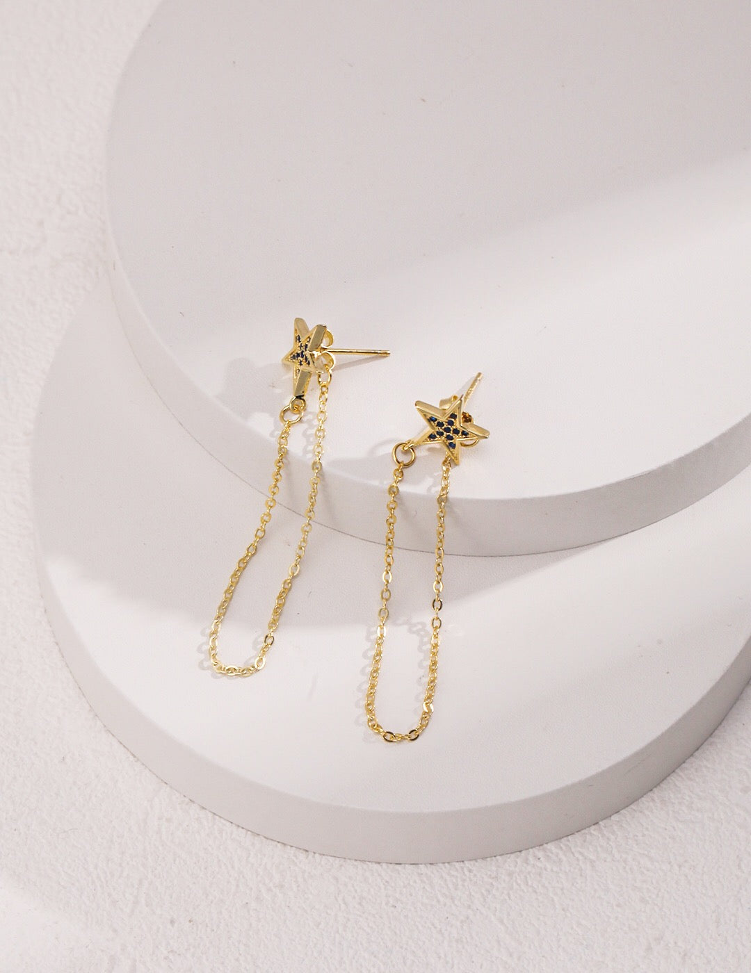 Elegant Star Dangle Threader Earrings made of gold vermeil, showcasing a unique design with a shimmering finish.