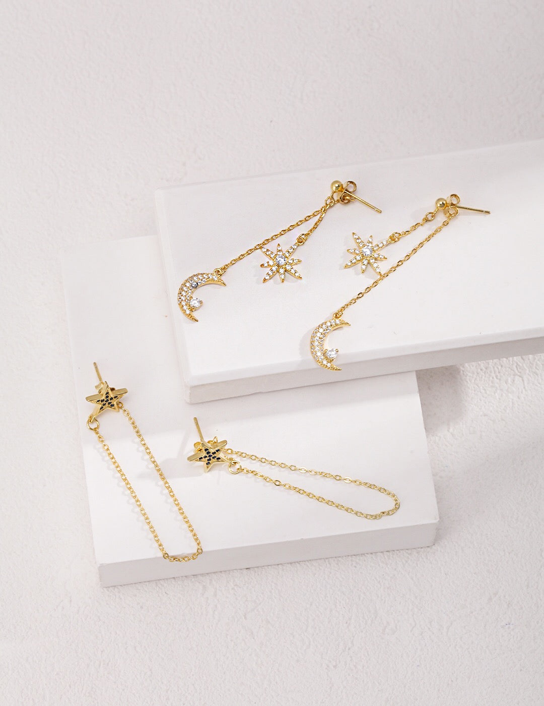 Elegant Star Dangle Threader Earrings made of gold vermeil, showcasing a unique design with a shimmering finish.