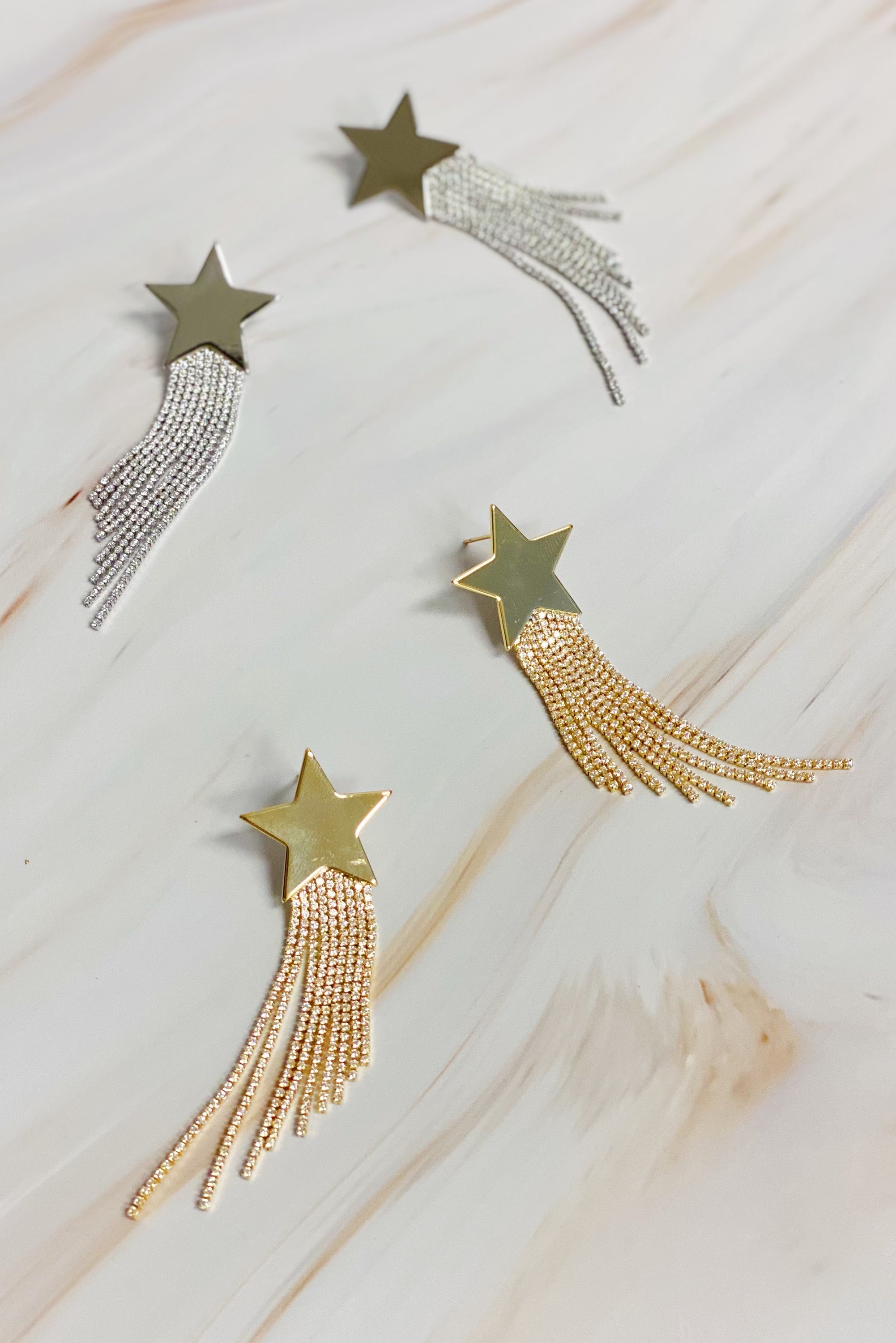 Elegant Star Shine Cascade Earrings featuring shiny rhinestone strands and a star accent, perfect for any occasion.