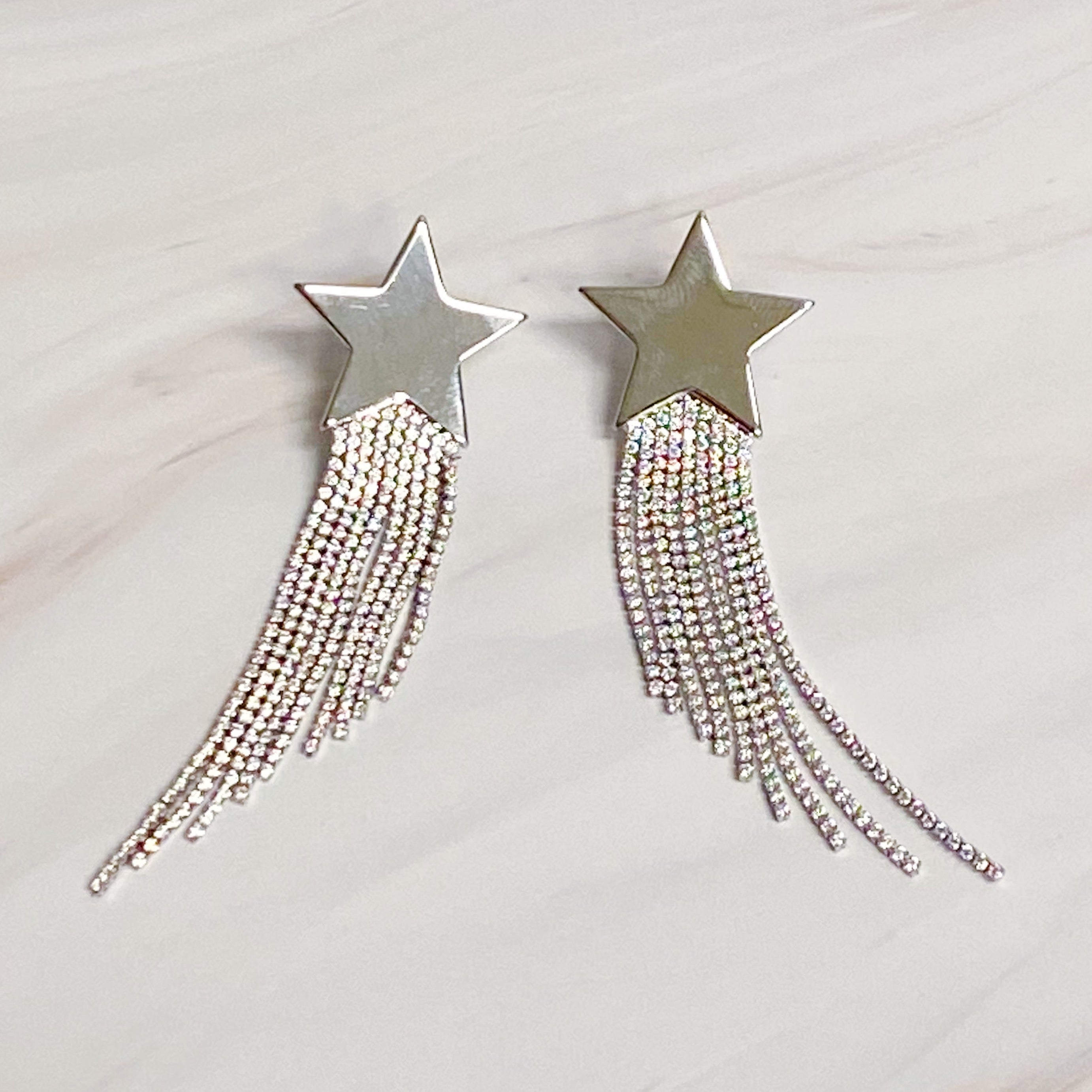 Elegant Star Shine Cascade Earrings featuring shiny rhinestone strands and a star accent, perfect for any occasion.