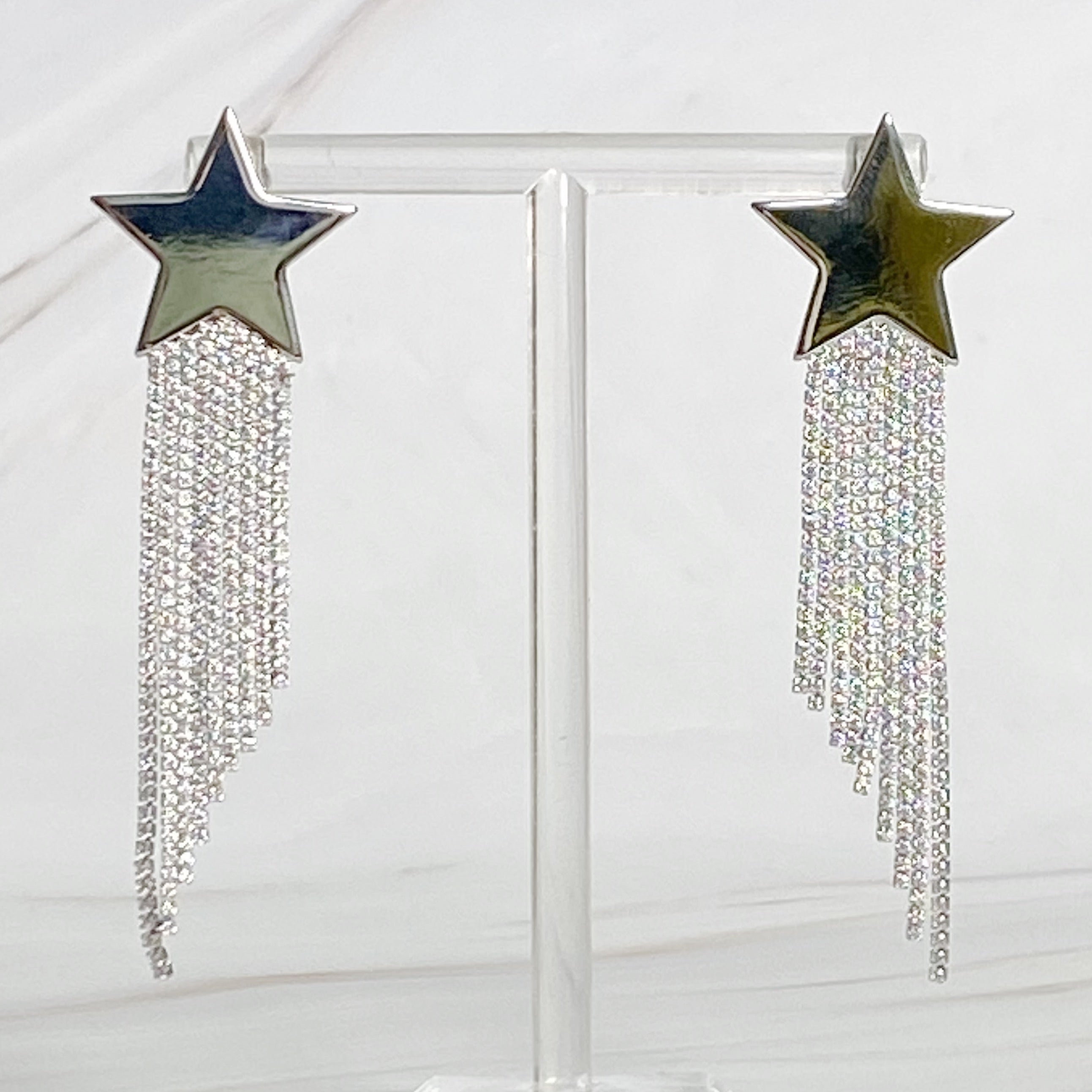 Elegant Star Shine Cascade Earrings featuring shiny rhinestone strands and a star accent, perfect for any occasion.