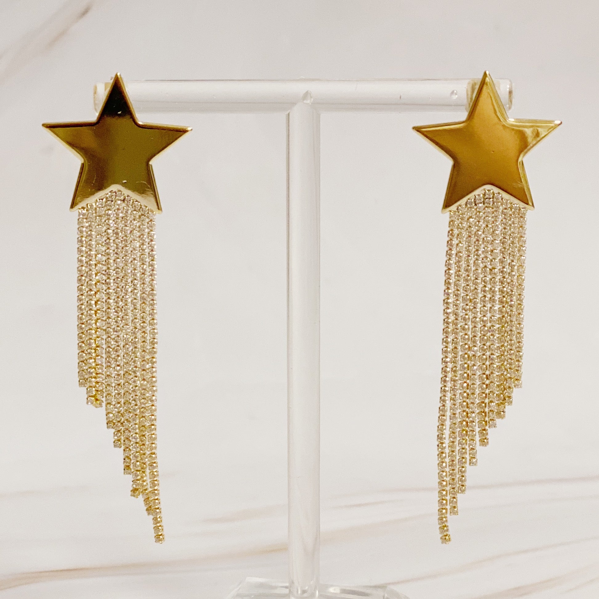 Elegant Star Shine Cascade Earrings featuring shiny rhinestone strands and a star accent, perfect for any occasion.