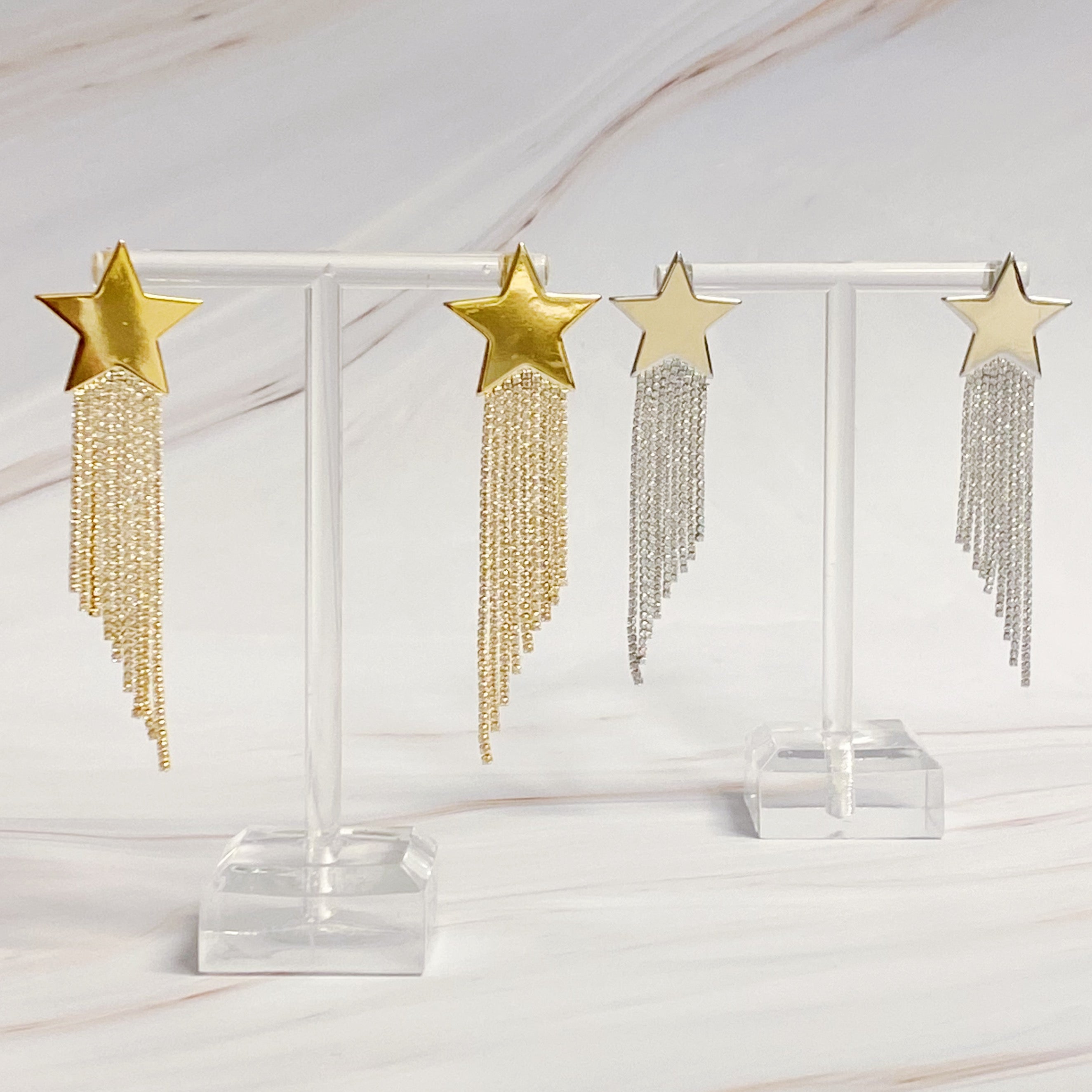 Elegant Star Shine Cascade Earrings featuring shiny rhinestone strands and a star accent, perfect for any occasion.