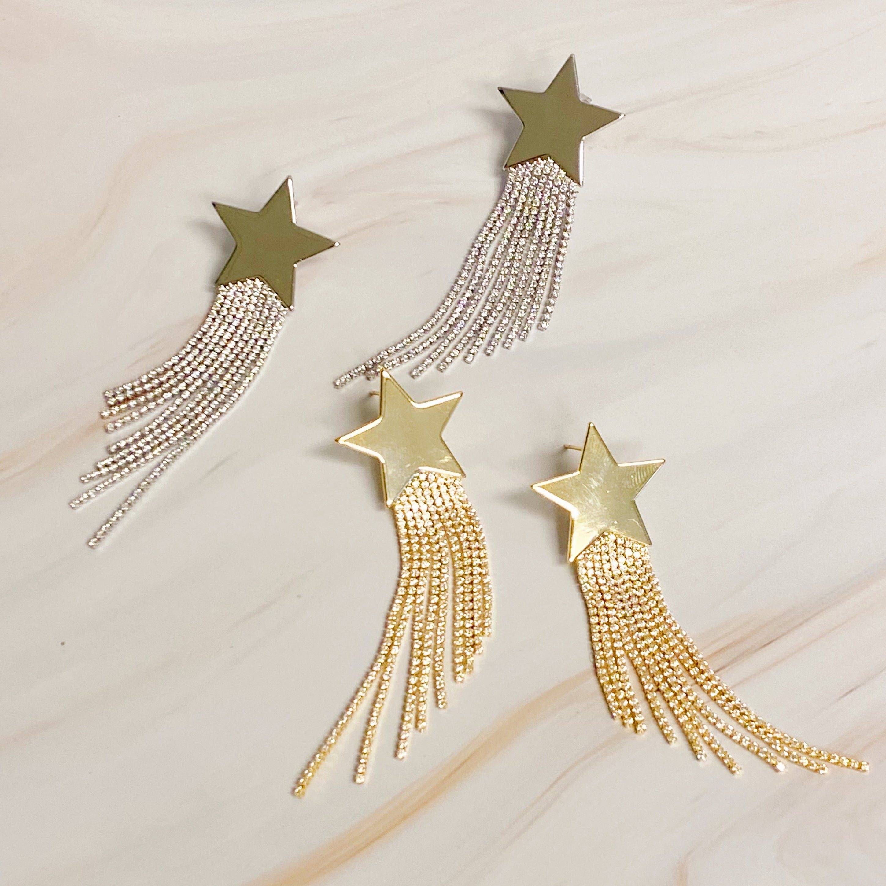 Elegant Star Shine Cascade Earrings featuring shiny rhinestone strands and a star accent, perfect for any occasion.