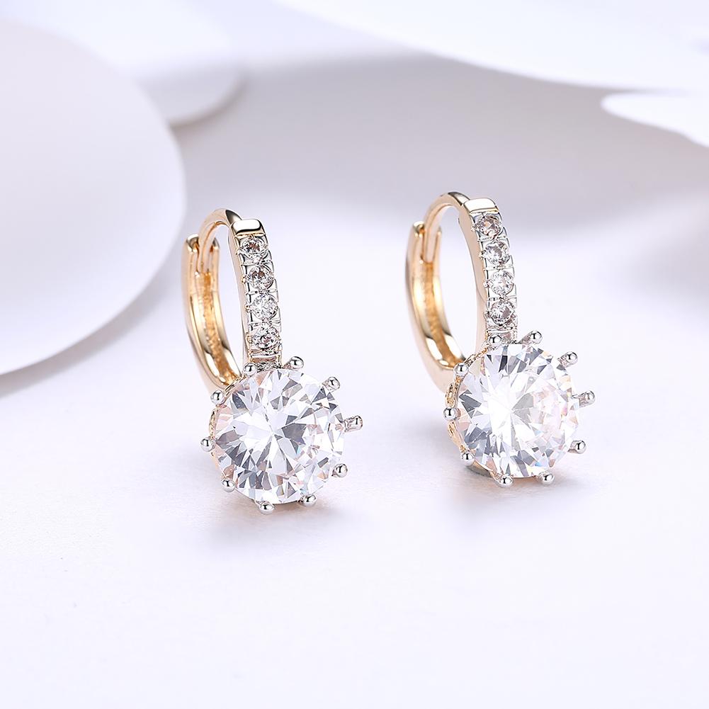 Elegant Starburst Elements Pav'e Leverback Earrings featuring certified crystals and 18K gold plating, designed for comfort and style.