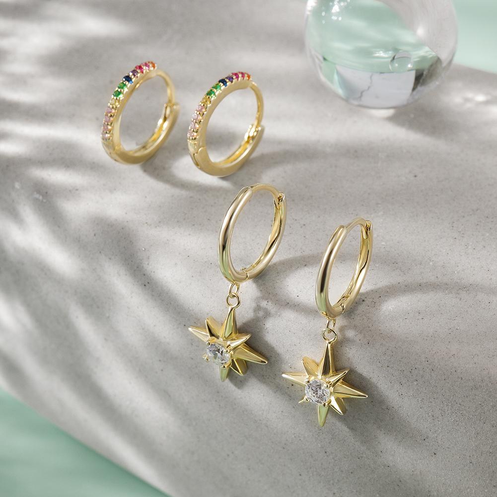 Starburst Rainbow Hoop Sets featuring vibrant cubic zirconia stones in a gold-plated sterling silver design, elegantly displayed in a gift box.