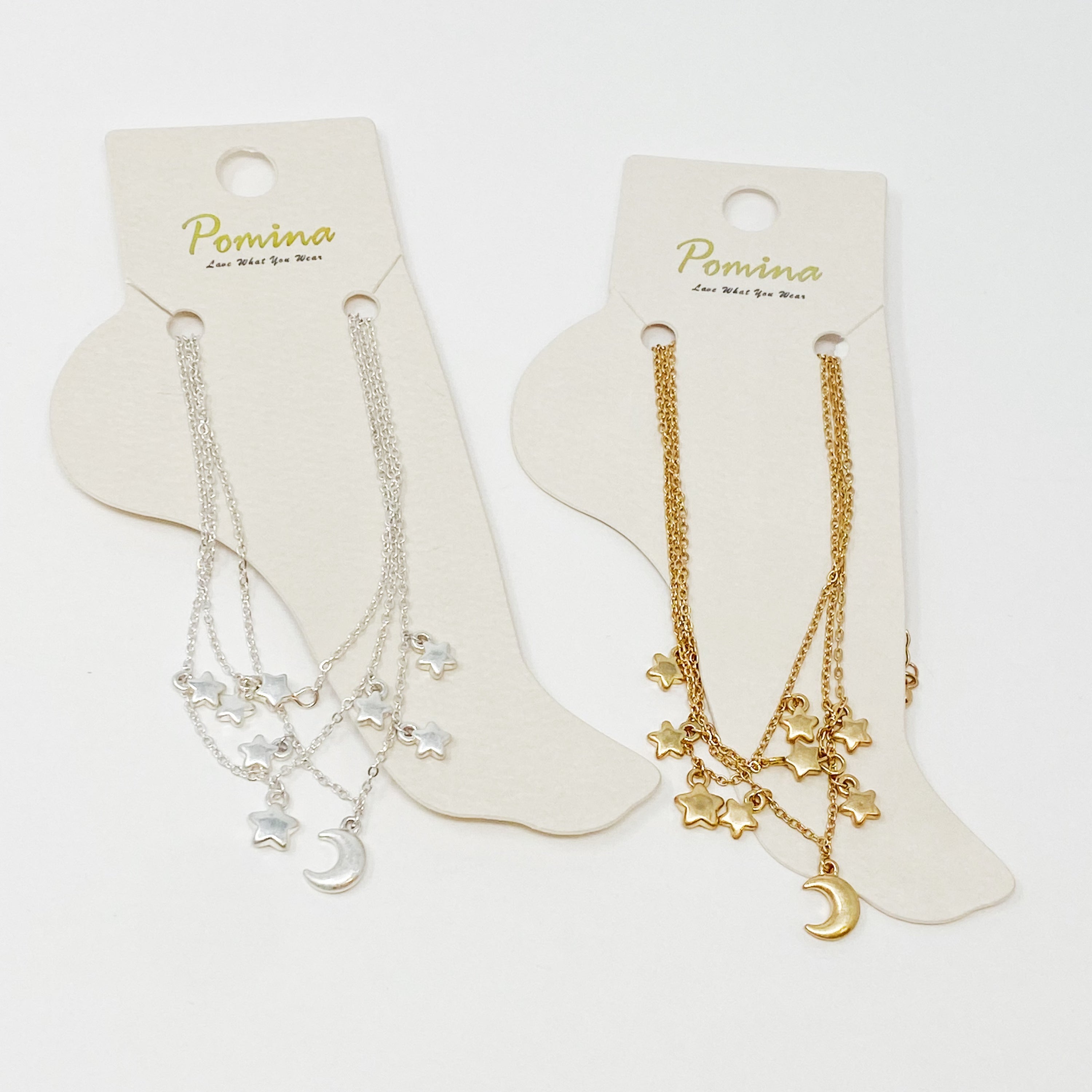 Set of 3 Starred Up Chain Anklets with star charms, showcasing a worn gold finish and adjustable chains.