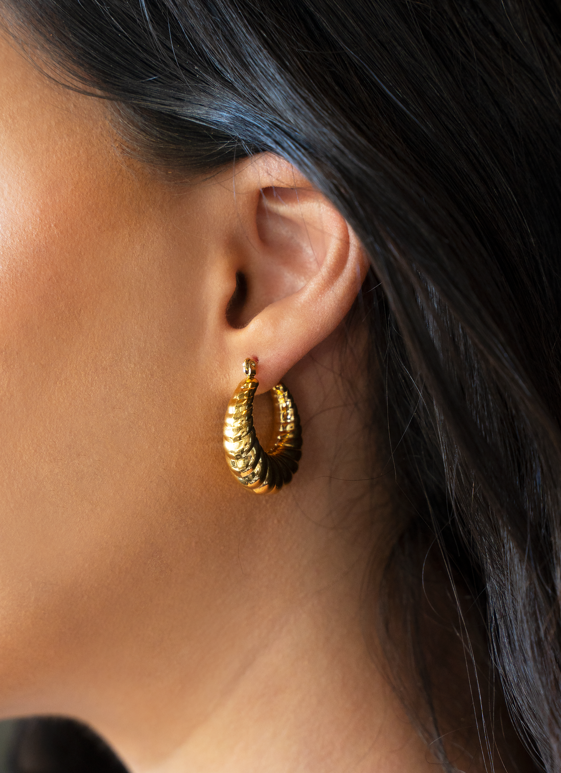 Elegant STARLA Hoops earrings featuring a crescent design with scalloped texture, made from stainless steel and 18k gold plating.