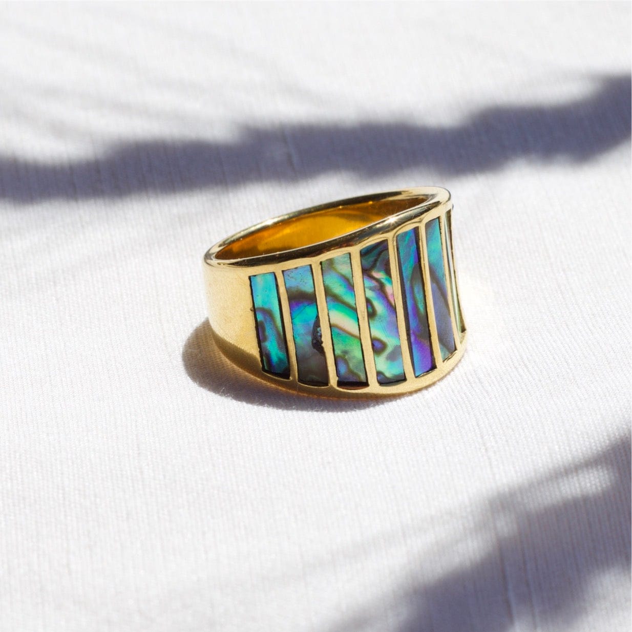 Stella Abalone Shell Statement Ring featuring geometric design and natural abalone shell stones, set in 18K gold plated stainless steel.