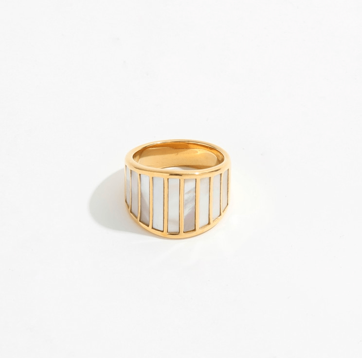 Stella Mother of Pearl Statement Ring featuring a bold geometric design with natural white shell stones and 18K gold plating.