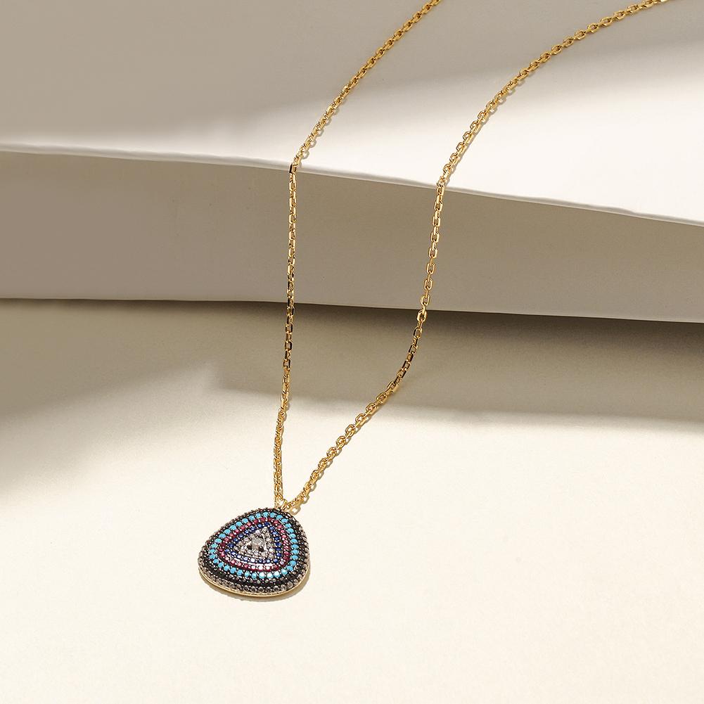 A beautiful sterling silver evil eye necklace featuring a turquoise charm and embedded zircon stones, elegantly displayed in a gift box.