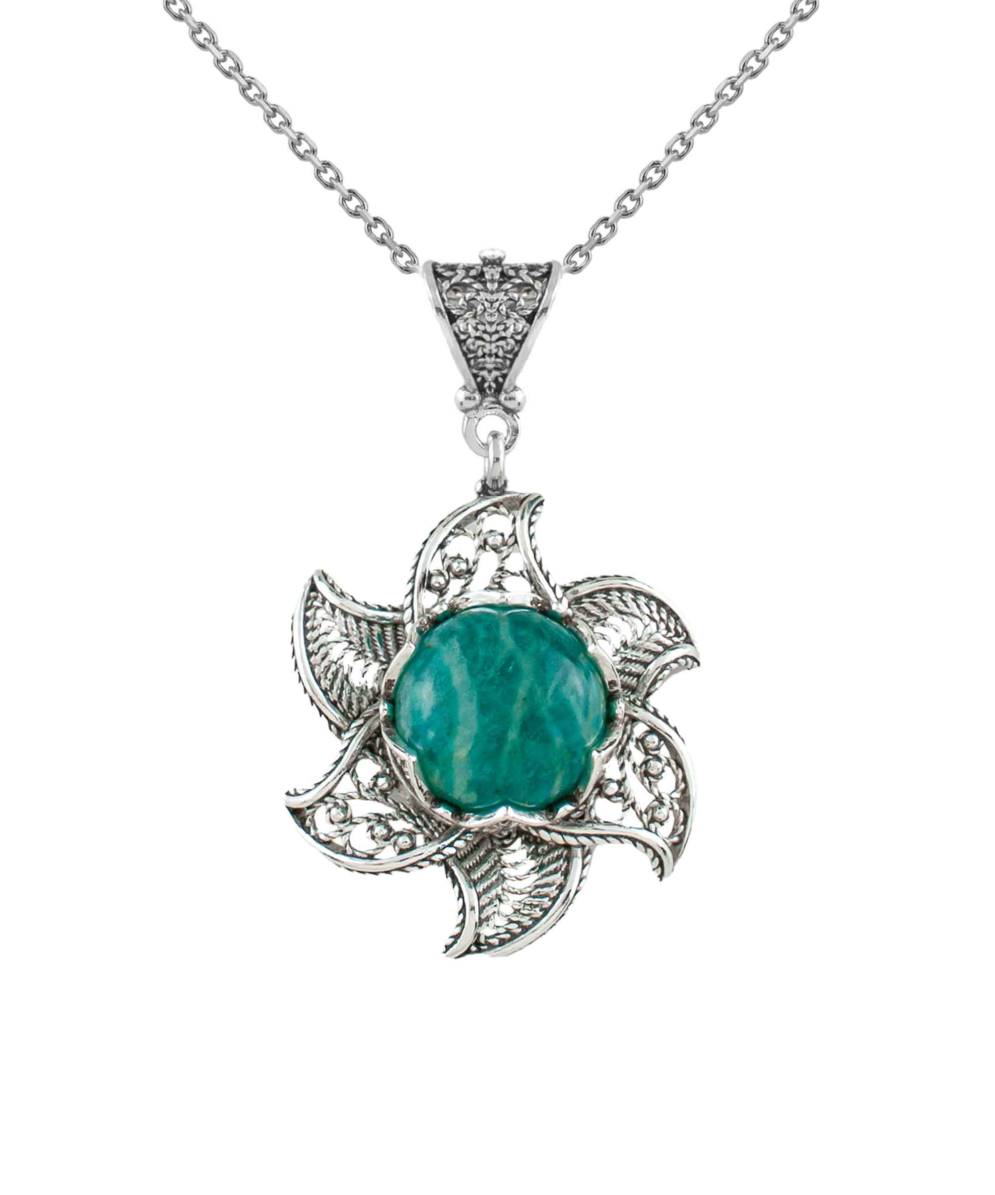 Sterling silver filigree necklace featuring a blossoming lotus flower pendant with a round amazonite gemstone at the center, elegantly displayed.